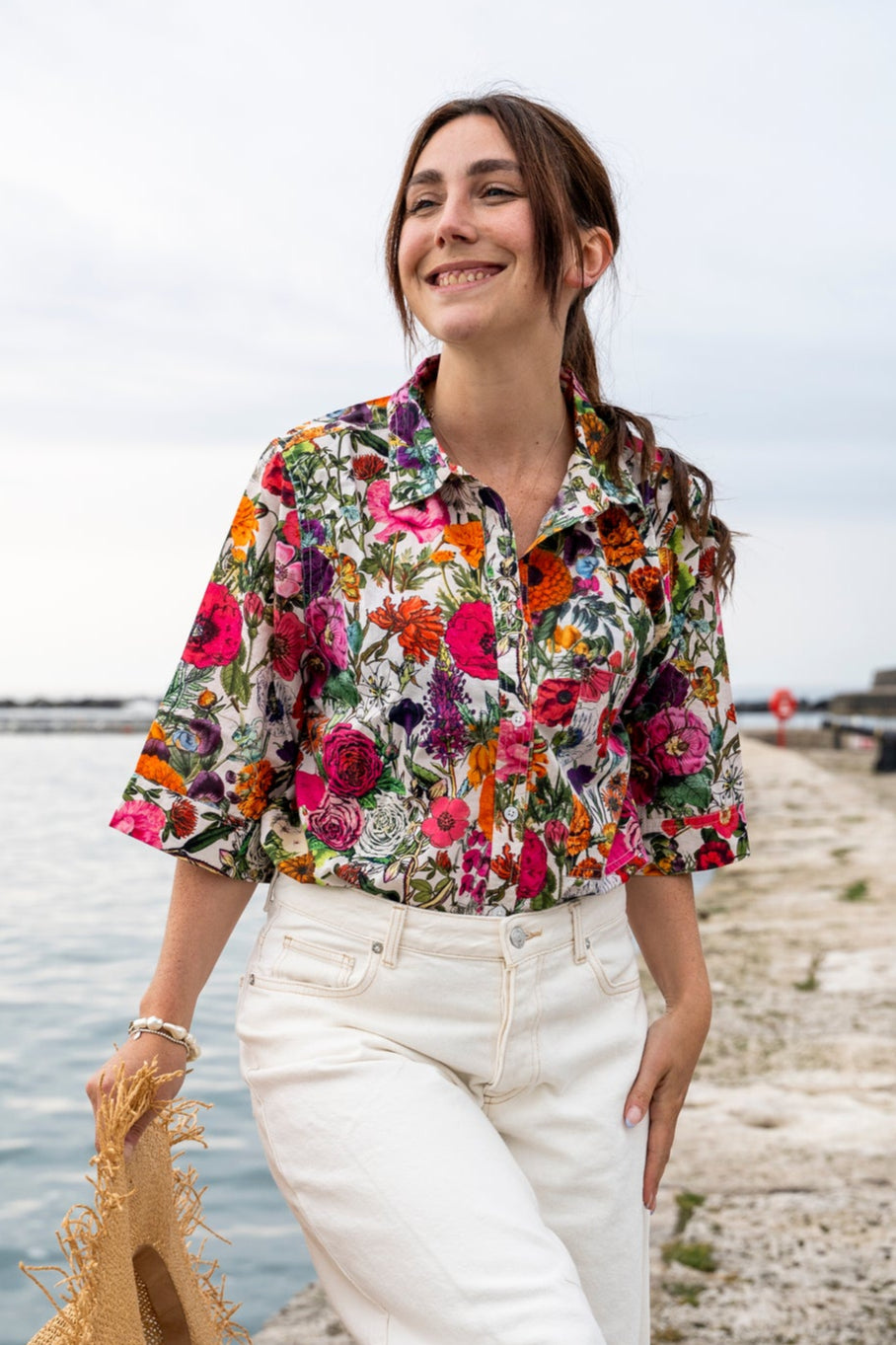 Rosehip Design Abbey cotton shirt has elbow length sleeves with a wide cuff. The hem is curved. Wear it with white jeans, shorts or one of our matching skirts.
Our unique Carnival print design is a riot of colour.