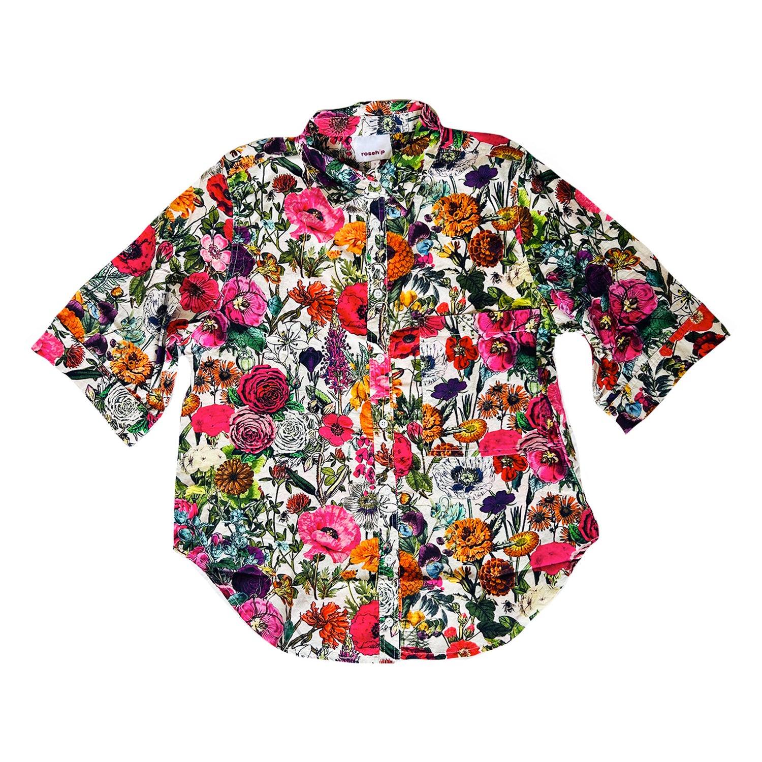 Rosehip Design Abbey cotton shirt has elbow length sleeves with a wide cuff. The hem is curved. Wear it with white jeans, shorts or one of our matching skirts.
Our unique Carnival print design is a riot of colour.