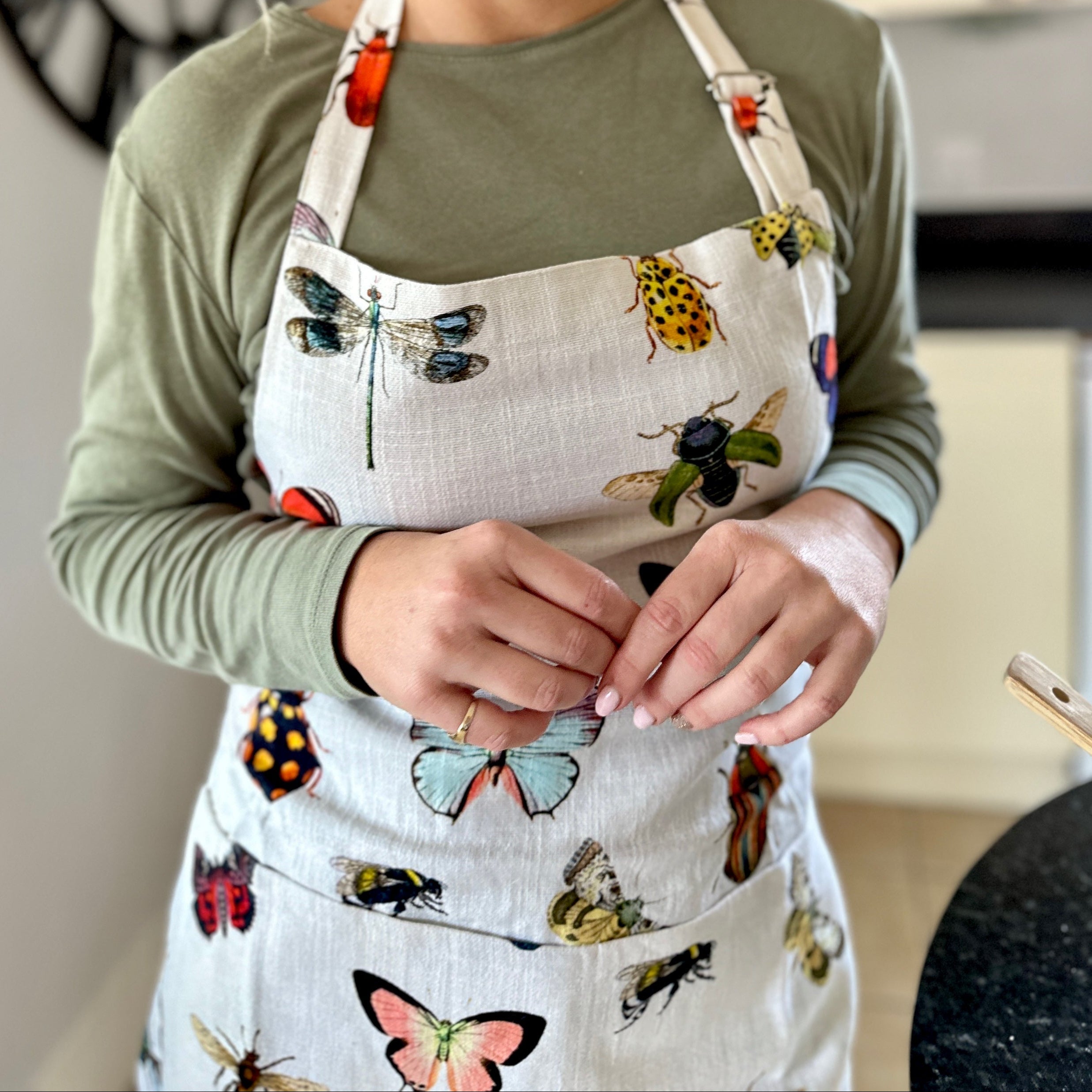Rosehip Design Apron - a heavyweight 100% cotton Apron with adjustable neck strap and two generous deep pockets in our stunning Bugs, inspired by nature.