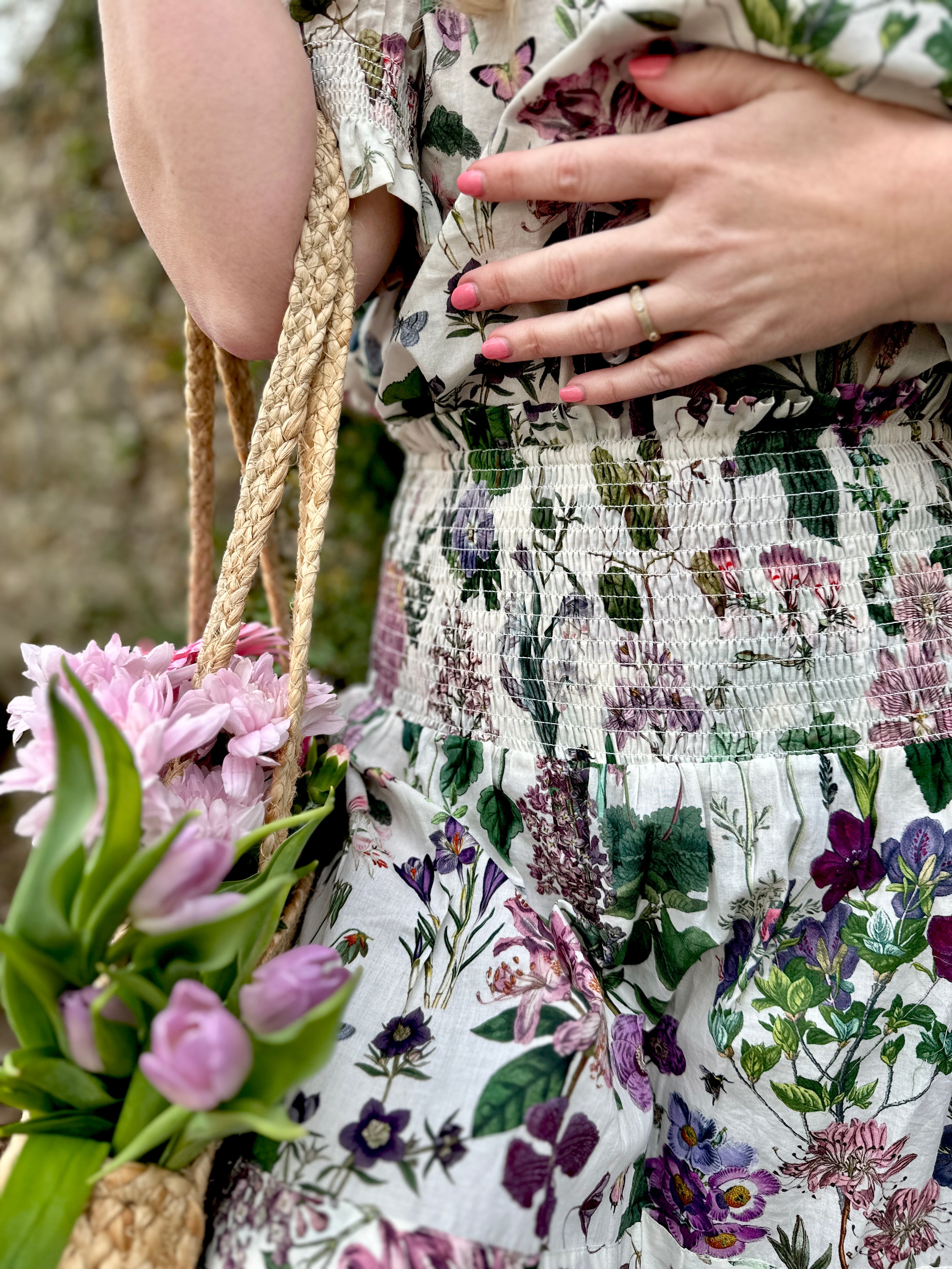 Rosehip Design Bella Cotton Skirt in our ever popular Mallow design is a beautifully feminine and effortlessly comfortable piece, perfect for Summer. Made from soft, breathable cotton it features a flattering shirred waistband that provides a flexible, comfortable fit. The tiered design adds movement & a touch of romantic charm, while the addition of practical pockets makes it as functional as it is stylish.
Whether paired with a simple tee or the coordinating Hannah Shirt, the Bella is a versatile staple.