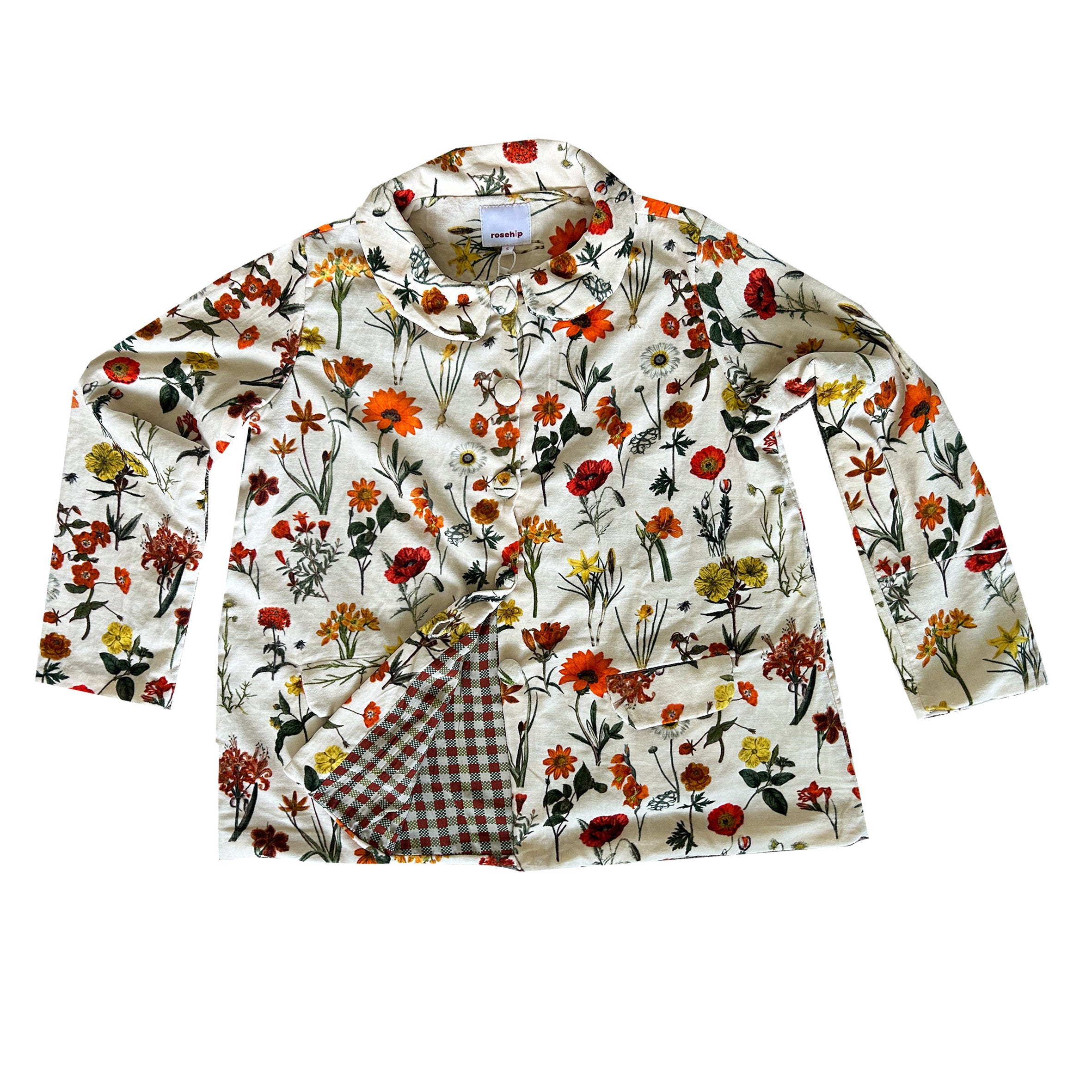 Wrap yourself in effortless elegance with our Rosehip Design Brompton Velvet Coat, designed in a rich velvet fabric that feels as luxurious as it looks. This statement coat features a playful autumn floral print, bringing warmth and charm to your seasonal wardrobe. Fully lined in co-ordinating checks, it offers a refined contrast and a polished finish inside and out.