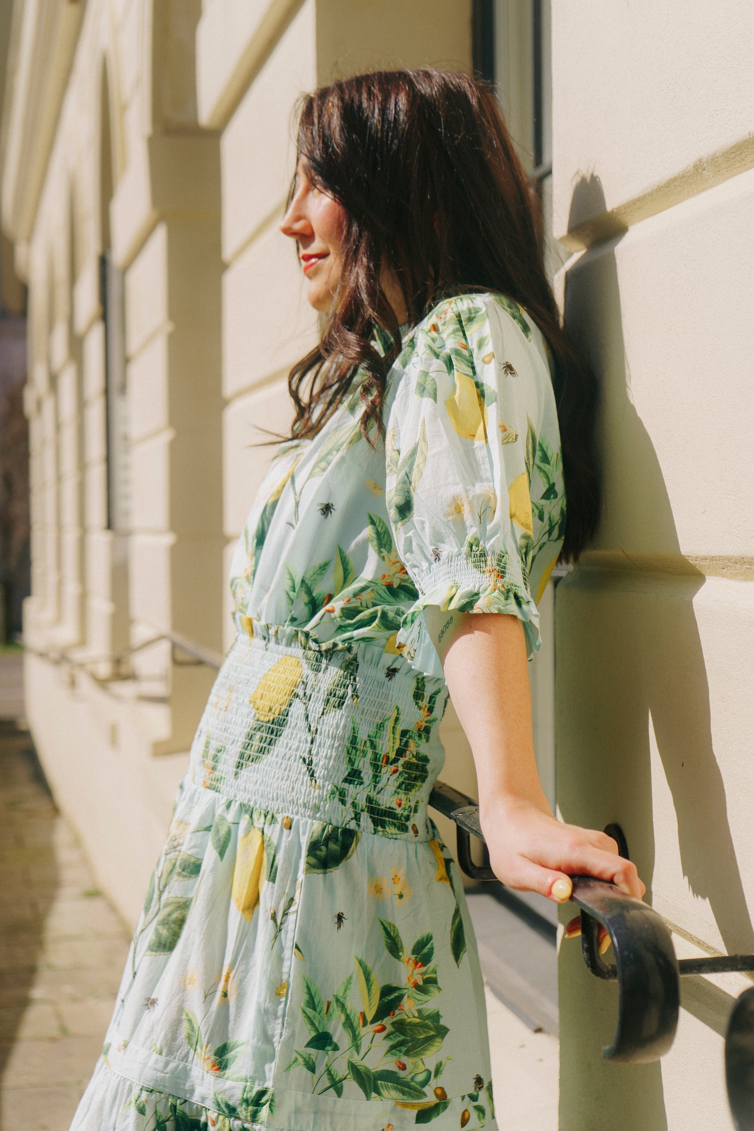 The Rosehip Design Hannah Cotton Shirt in Citrus Blue is a timeless blend of elegance and comfort. Made from soft cotton, it features a delicate frilled collar and intricate smocking on the sleeves for a touch of vintage charm. Designed for effortless styling, it pairs beautifully with the Bella Skirt