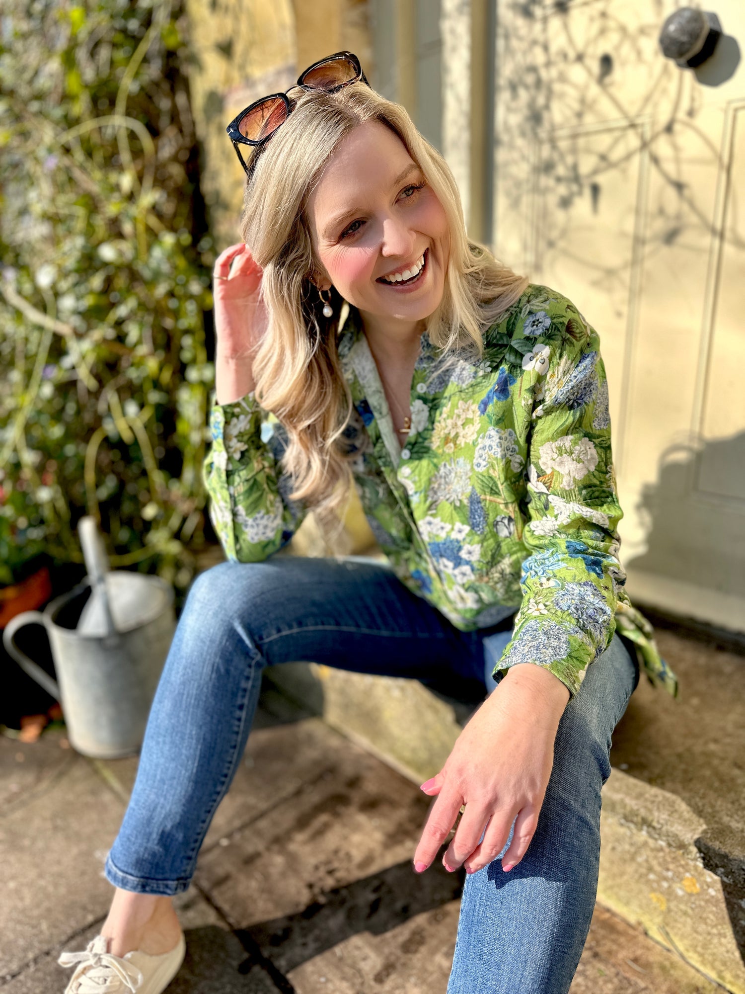 Embrace the blooming season with the Rosehip Design Harriet Linen Shirt. This classic piece features front buttons and long sleeves with a cuff for a timeless look. The side button detail adds a touch of uniqueness, while the floral design adds a playful twist. Stay on trend in our Spring Greens botanical design.