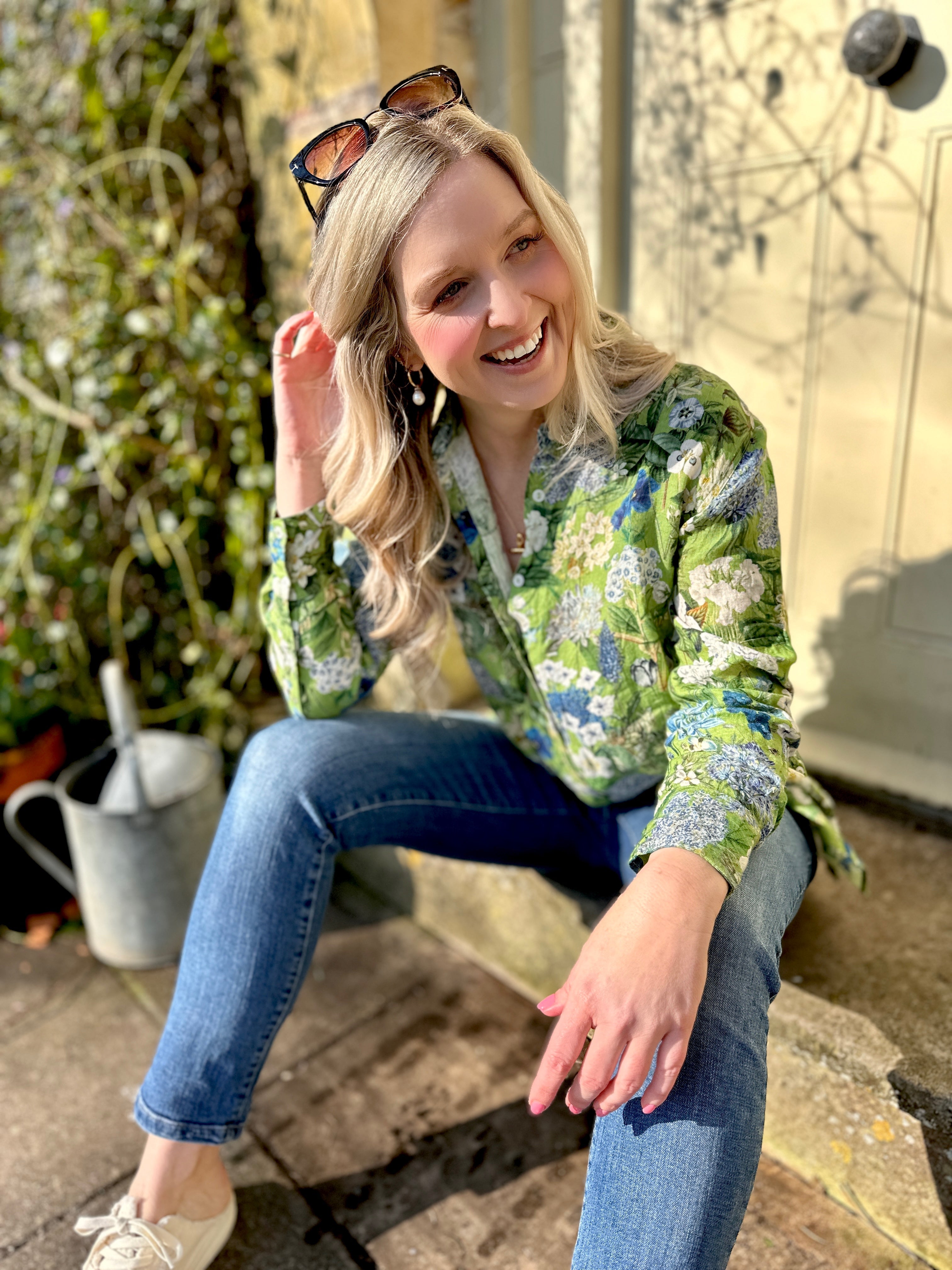 Embrace the blooming season with the Rosehip Design Harriet Linen Shirt. This classic piece features front buttons and long sleeves with a cuff for a timeless look. The side button detail adds a touch of uniqueness, while the floral design adds a playful twist. Stay on trend in our Spring Greens botanical design.