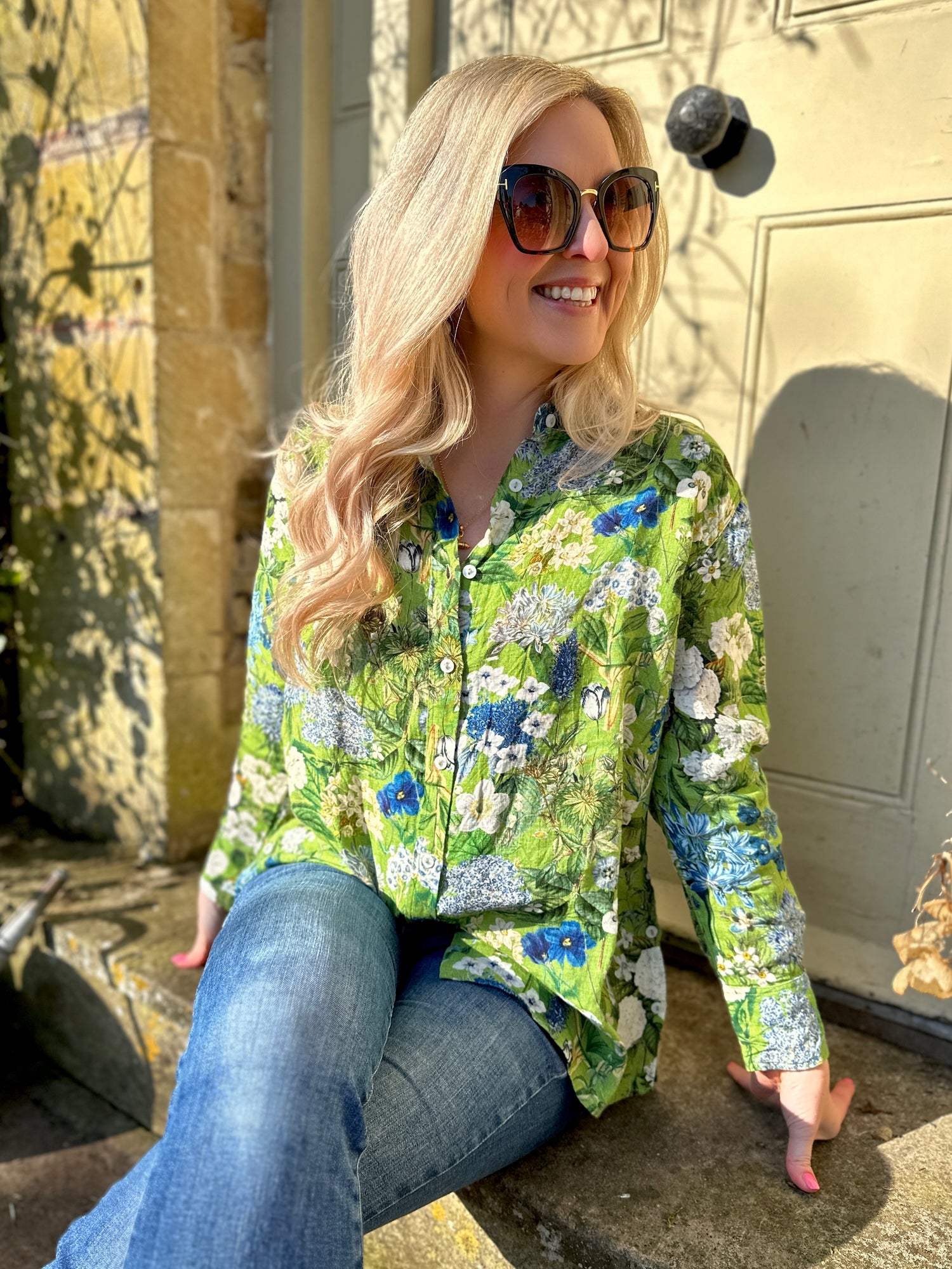 Embrace the blooming season with the Rosehip Design Harriet Linen Shirt. This classic piece features front buttons and long sleeves with a cuff for a timeless look. The side button detail adds a touch of uniqueness, while the floral design adds a playful twist. Stay on trend in our Spring Greens botanical design.
