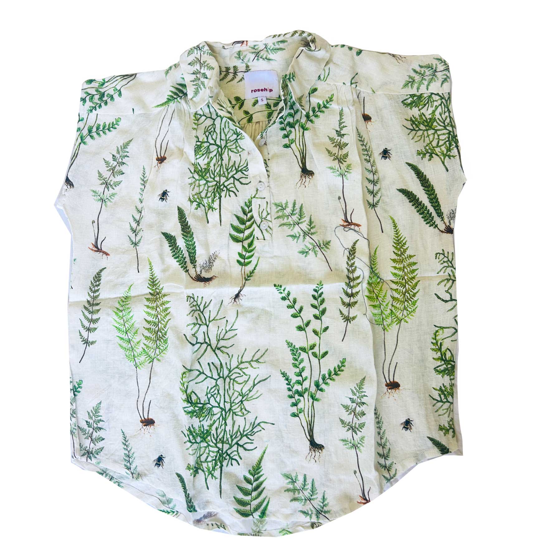 Light, breathable, and effortlessly stylish — the Jemma Shirt from Rosehip Design is made from 100% pure linen and finished with a subtle Ferns print for a soft botanical touch. Designed with a neat collar, a partial button front, and gently capped sleeves, it&