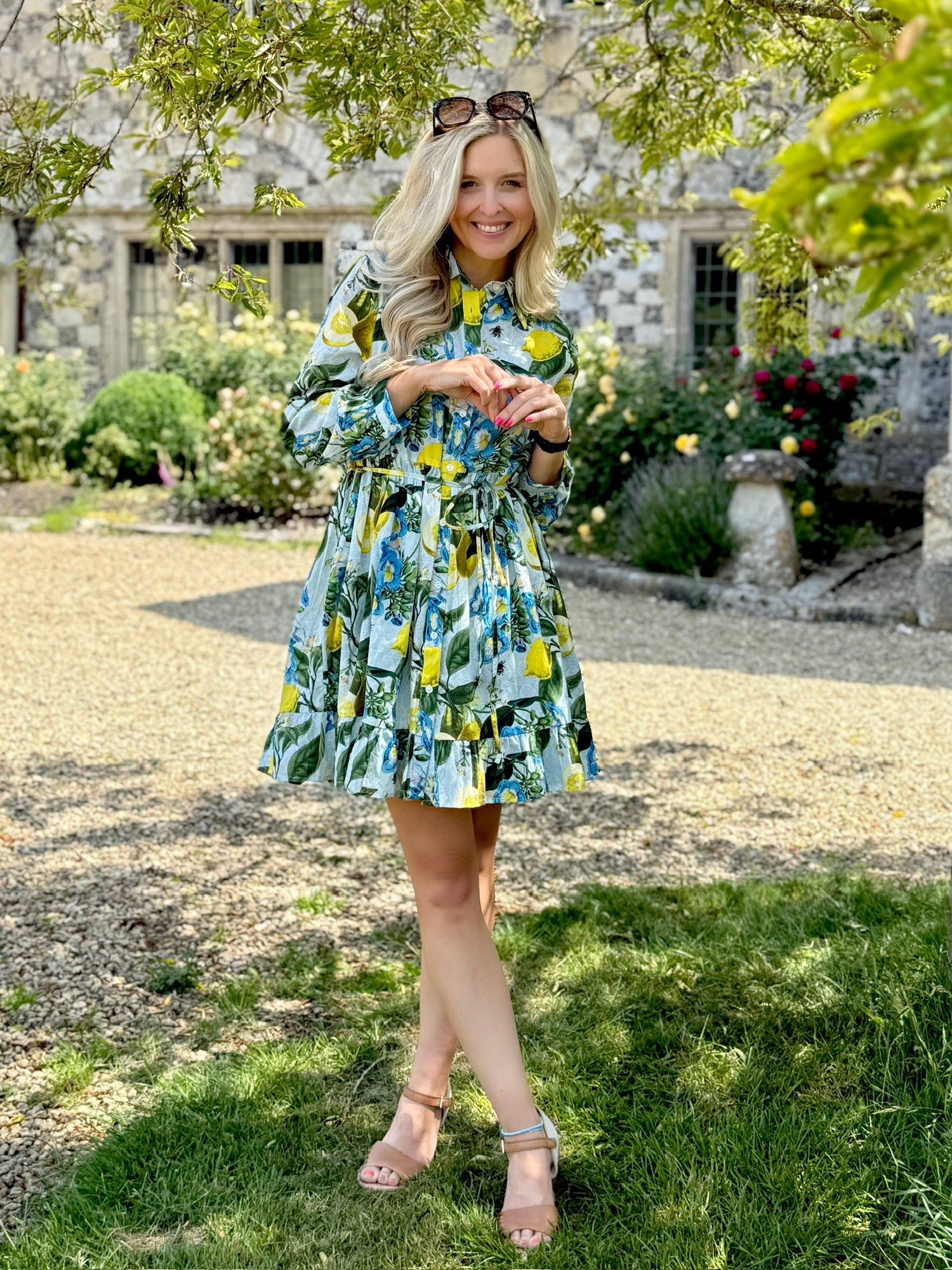 Rosehip Design Josie Cotton Dress is a knee-length cotton tiered dress with a tie belt and pockets. Make a statement in our zesty Sicily design.