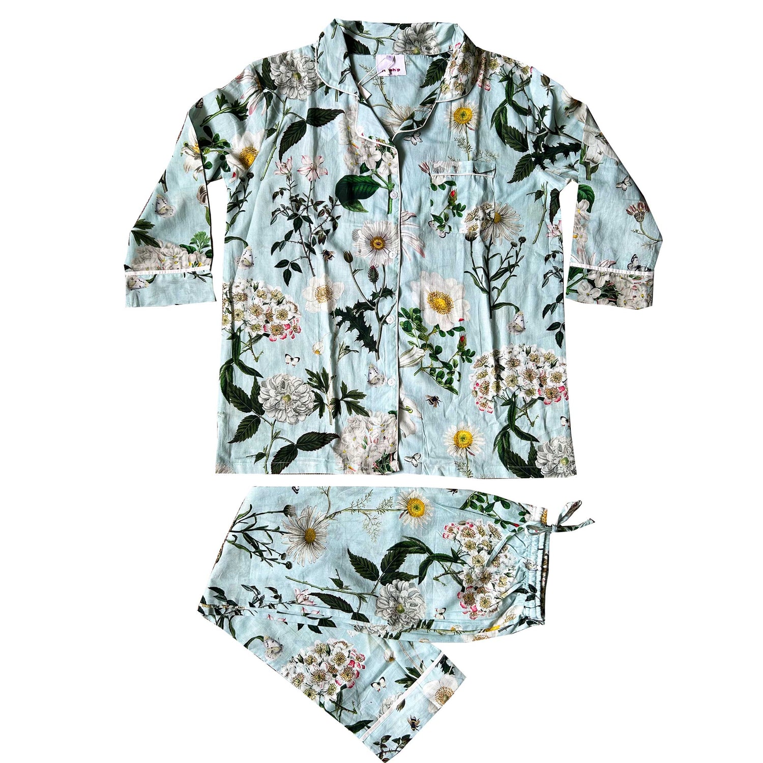 Rosehip Design Long Pyjamas in our calming Heavenly Aqua print are made from 100% soft Indian cotton voile. The cuffs have contrast piping and the bottoms have drawstring as well as elastic. They are a comfy fit and come packaged in a matching drawstring bag.