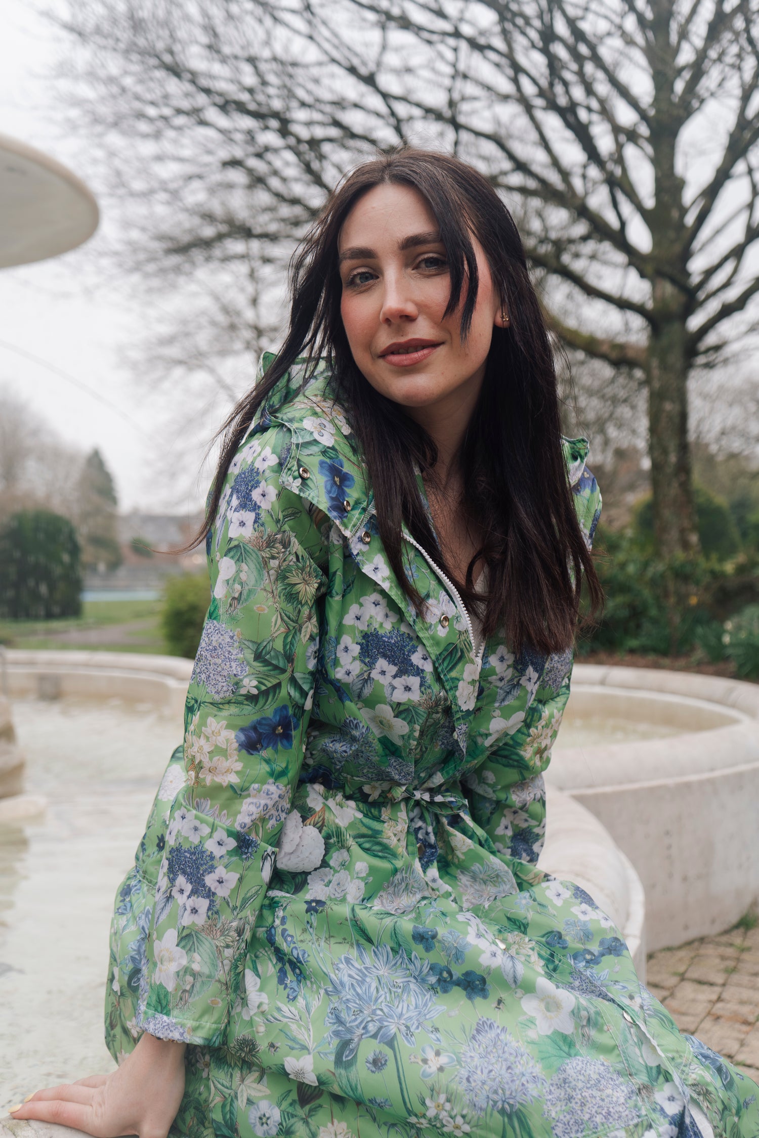 Beautiful light-weight calf length summer parka in a fresh Spring Green design. 
The Windsor Parka from Rosehip Design has a long tiered skirt, drawstring waist and fully lined hood.