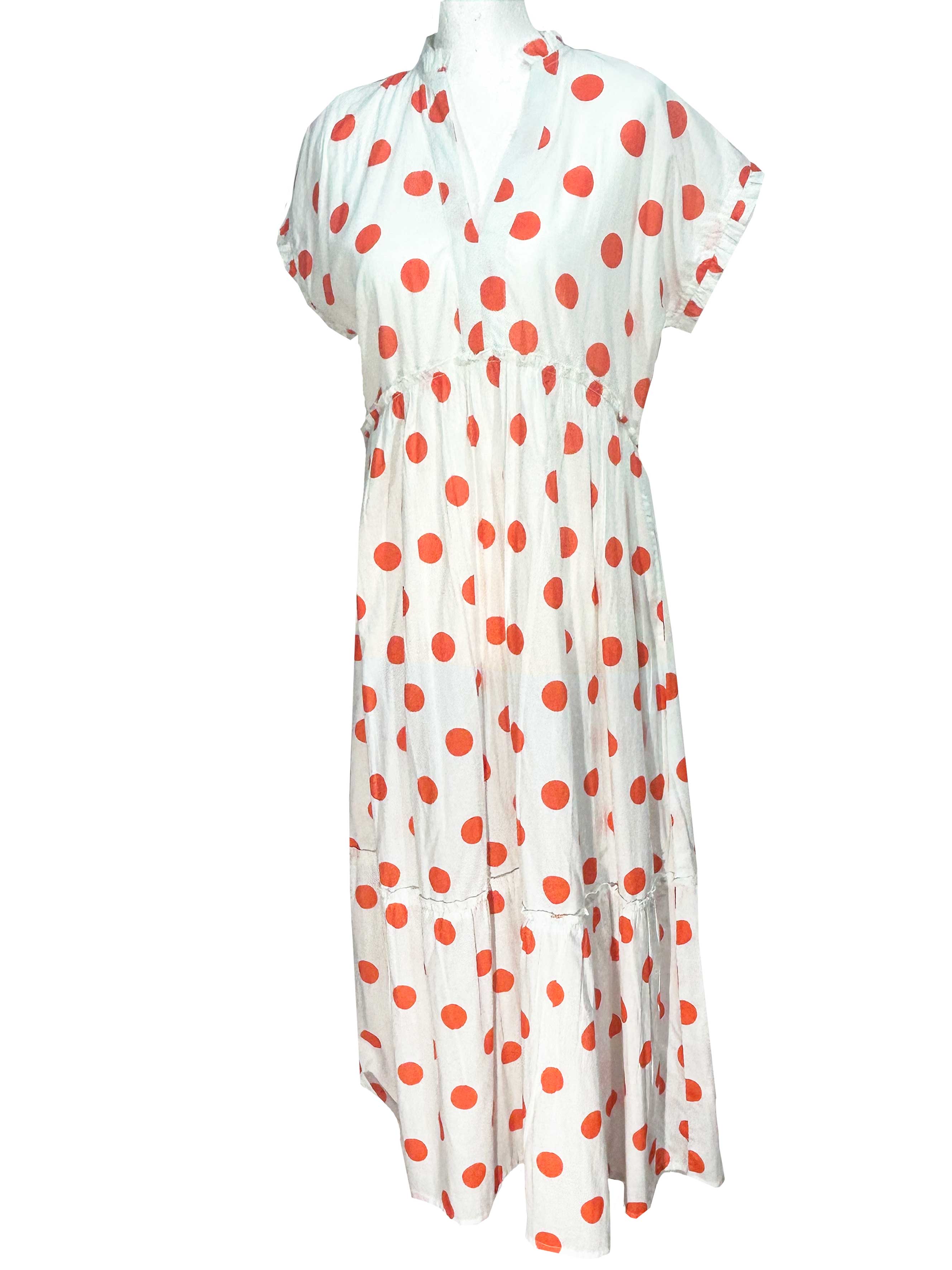 Rosehip Design Olivia is a beautiful cotton dress in our happy and fun Orange Dot print. The Olivia dress has short, capped sleeves with a rough frill. The skirt is tiered and has pockets.