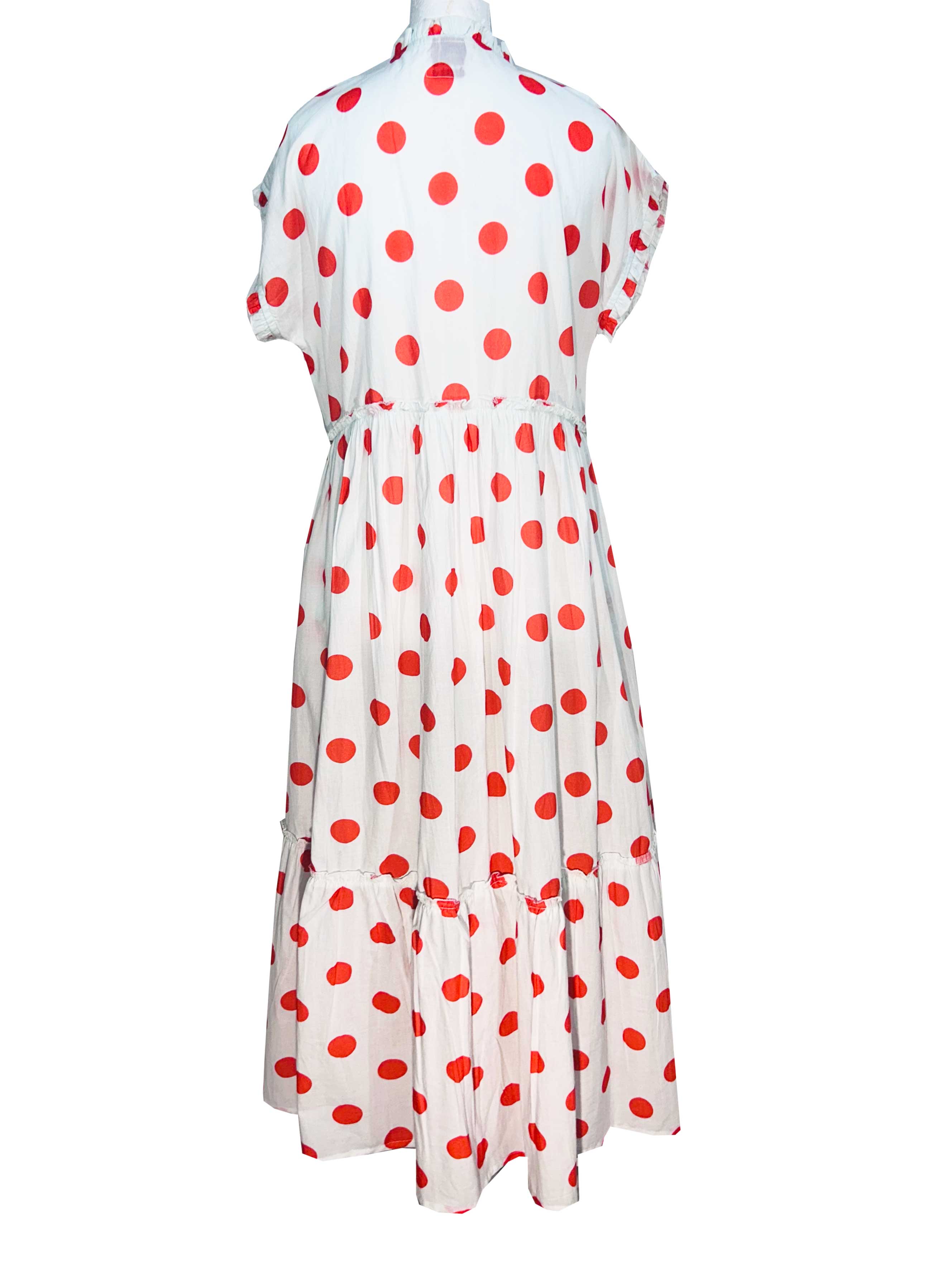 Rosehip Design Olivia is a beautiful cotton dress in our happy and fun Orange Dot print. The Olivia dress has short, capped sleeves with a rough frill. The skirt is tiered and has pockets.