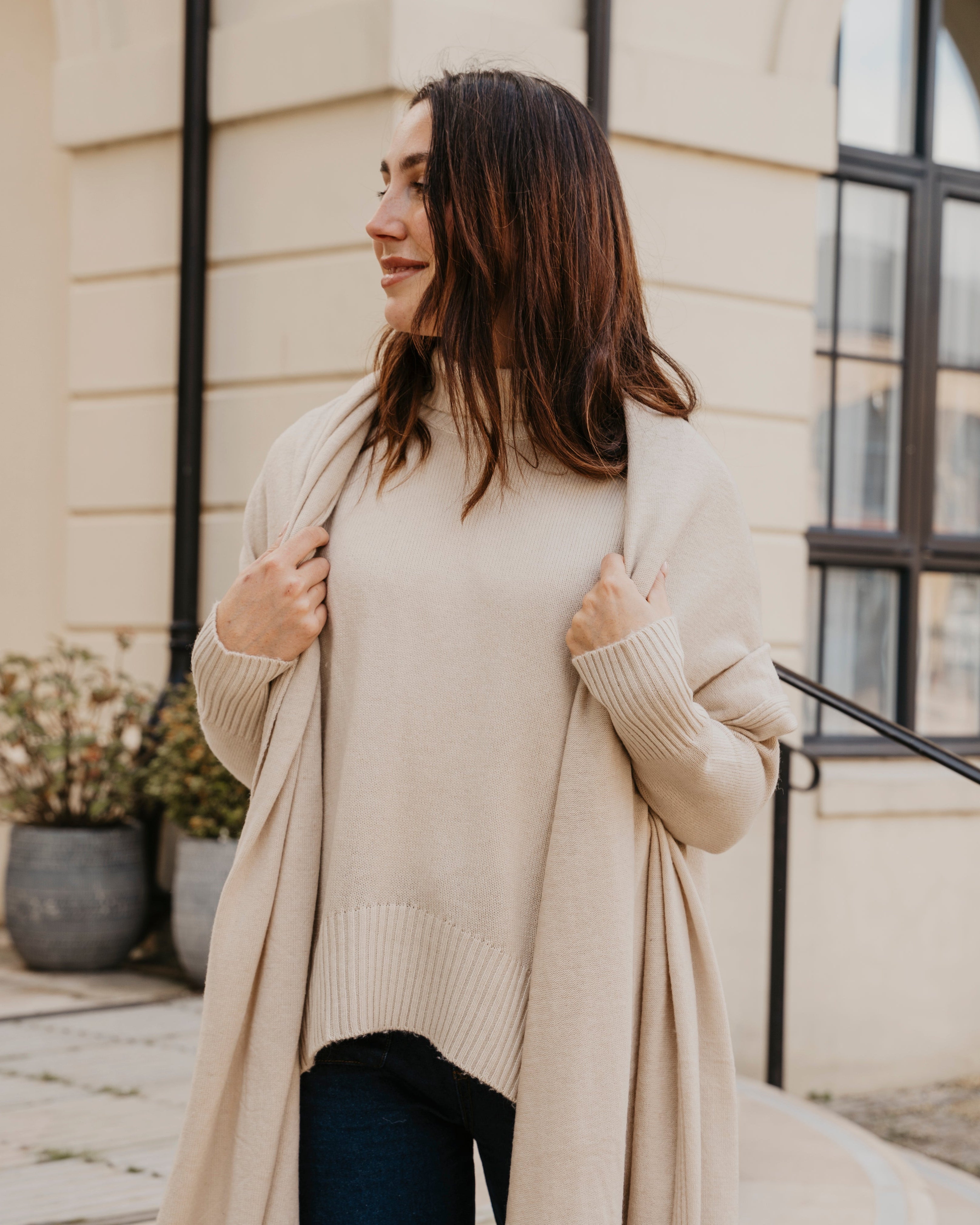 Stay effortlessly stylish and snug in this Rosehip Design woollen roll neck jumper, designed with a modern high-low hem that falls longer at the back for a flattering, easy silhouette. Crafted from soft, warming wool, it offers both comfort and elegance — perfect for layering on chilly days. The classic roll neck adds a touch of sophistication, while the relaxed fit makes it a versatile wardrobe staple you’ll reach for all season.