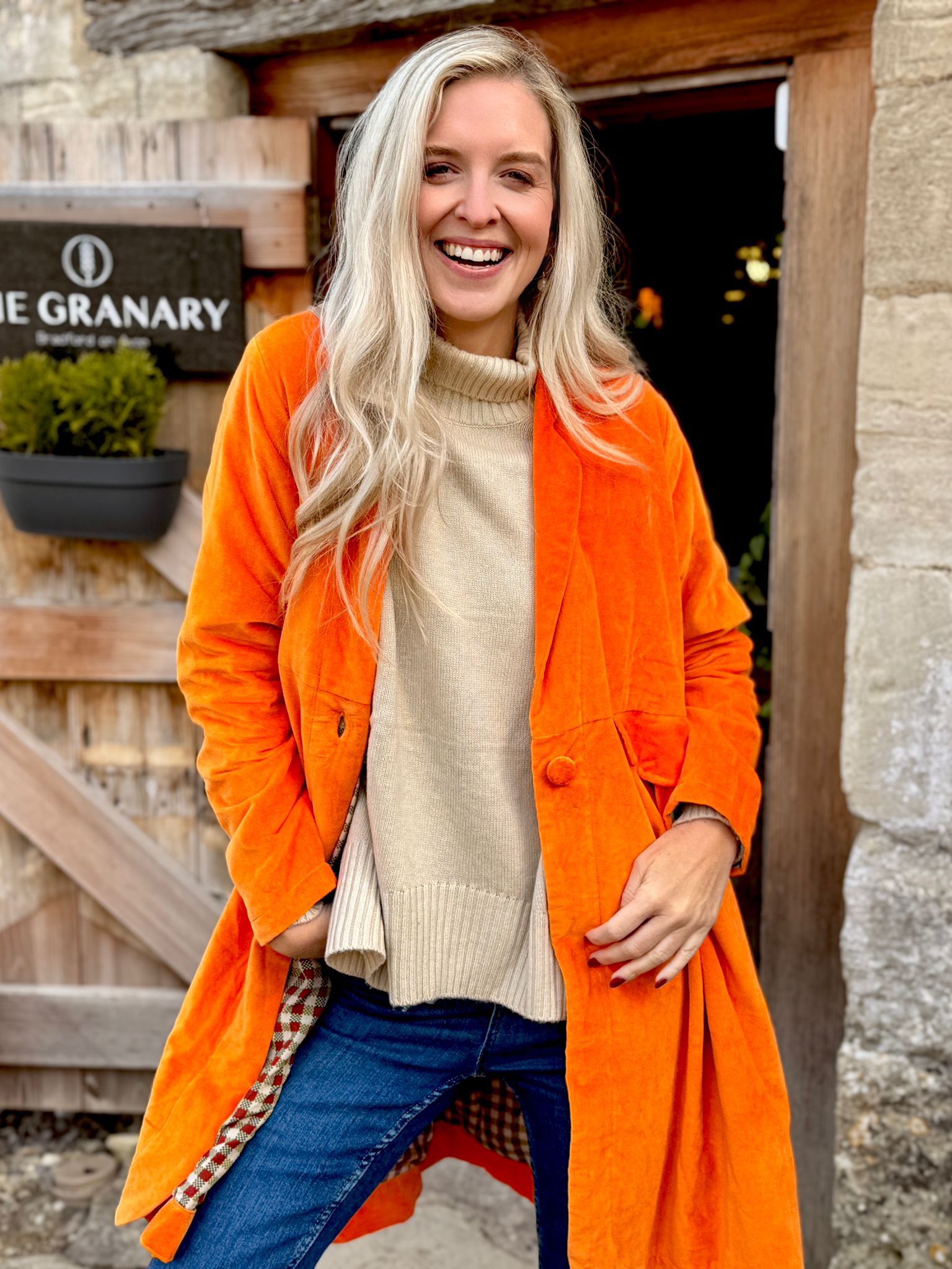 Wrap yourself in autumn warmth with this Rosehip Design statement velvet coat, in a rich, vibrant orange that perfectly echoes the season. The soft velvet exterior is complemented by a classic check lining, adding a touch of timeless style to its bold, modern silhouette. Luxuriously warm yet effortlessly wearable, it’s the perfect layer for crisp autumn days — whether you’re strolling through the countryside or heading into the city.