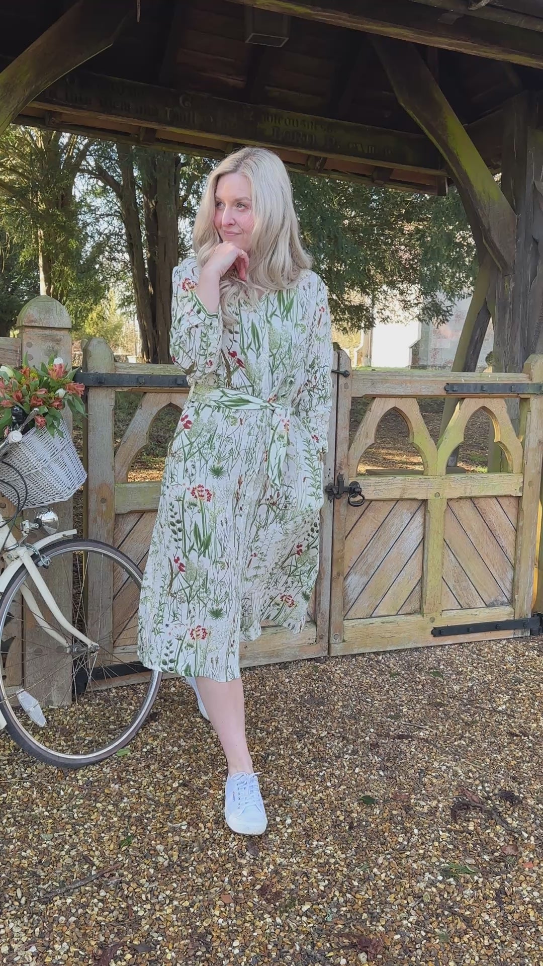 Spring into style with the Rosehip Design Lydia Linen Dress in Wildgrass design. This shirtwaister dress features a beautiful floral design and a fabric tie belt for a flattering fit. With its long sleeves and button-up front, this dress is the perfect combination of comfort and chic. Ready to bloom in your wardrobe!