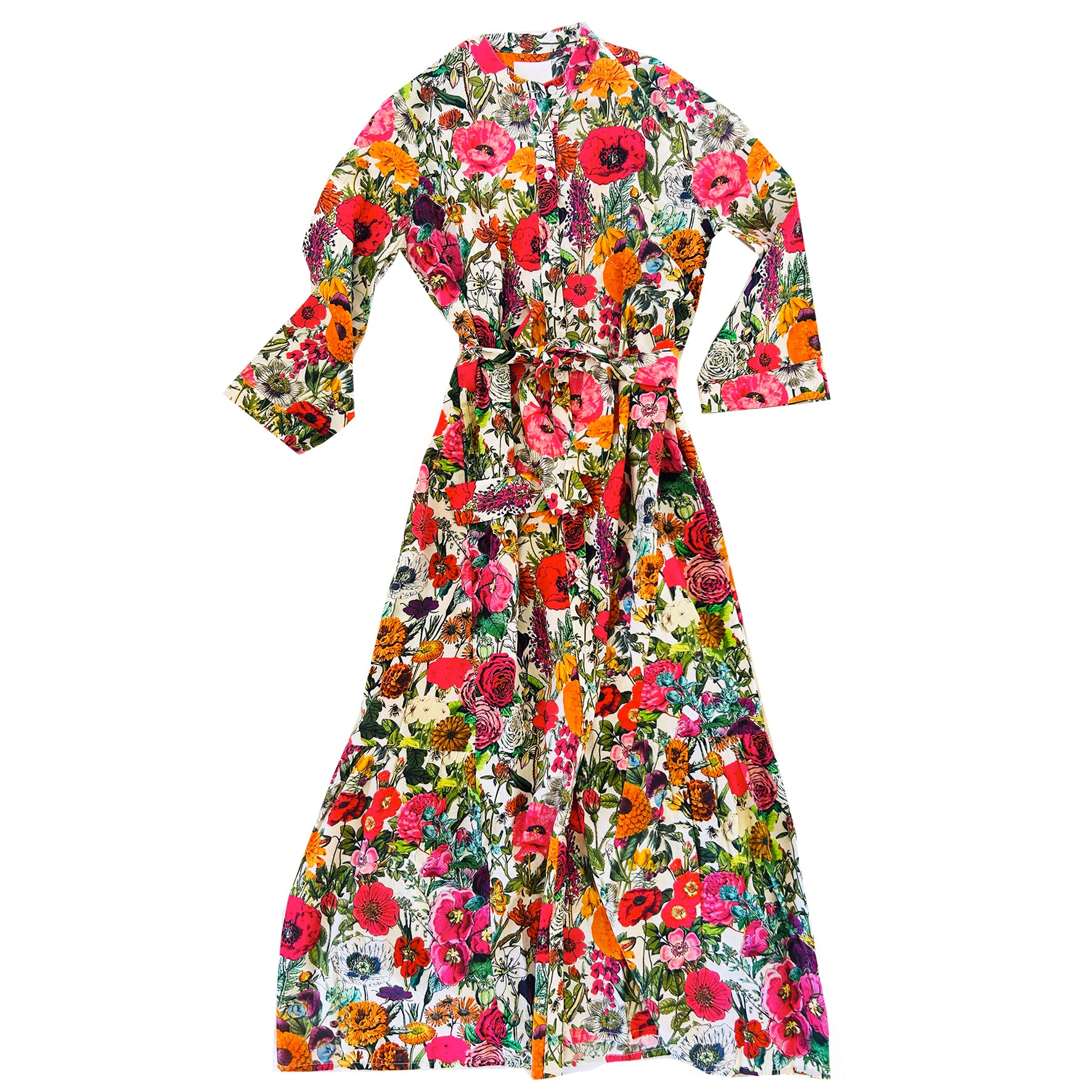 The Rosehip Design Ally Cotton Dress is a versatile wardrobe staple with effortless charm. Featuring a button-down front, handy pockets, and a flattering half-frill hem, it offers both style and comfort. Wear it loose for a relaxed feel or cinch the waist with the tie belt for a more defined silhouette—perfect for any occasion.

Carnival print is a riot of colour