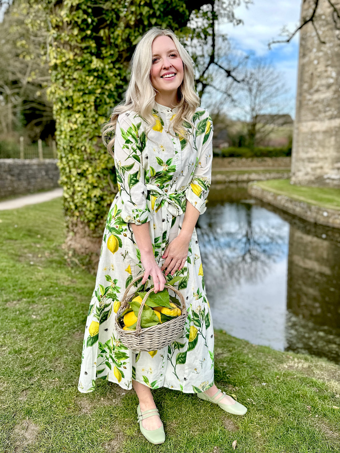 staple with effortless charm. Featuring a button-down front, handy pockets, and a flattering half-frill hem, it offers both style and comfort. Wear it loose for a relaxed feel or cinch the waist with the tie belt for a more defined silhouette—perfect for any occasion.