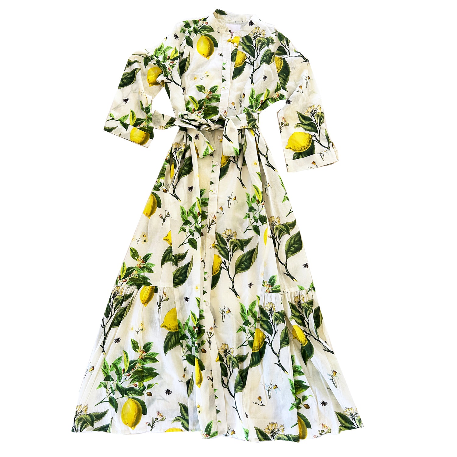 The Rosehip Design Ally Cotton Dress in Citrus print is a versatile wardrobe staple with effortless charm. Featuring a button-down front, handy pockets, and a flattering half-frill hem, it offers both style and comfort. Wear it loose for a relaxed feel or cinch the waist with the tie belt for a more defined silhouette—perfect for any occasion.