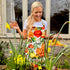 This striking floral apron from Rosehip Design is a stylish and practical choice for cooking or gardening.
The comfortable cotton design features an adjustable neck strap and generous deep pockets for tools.
Durable and machine-washable, it offers full coverage and long-lasting elegance in the kitchen.
Also available in Matching Tea Towels and Heart Pot Holders. 