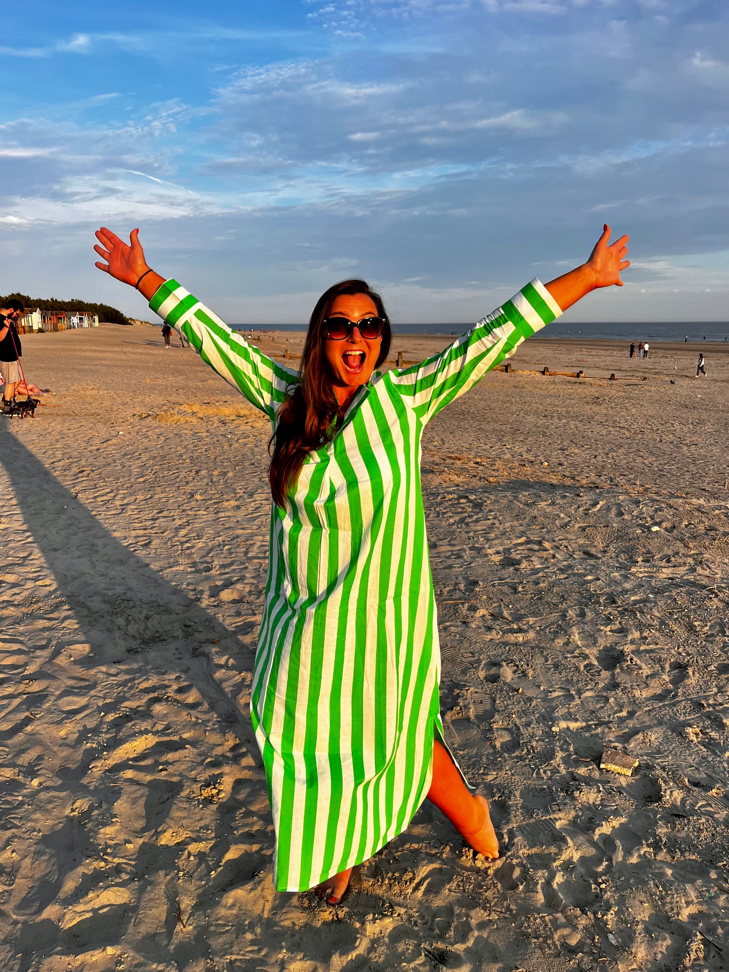 Rosehip Design Brige Kaftan Dress. Lovely long loose flowing Kaftan dress with pockets in our striking Verde green stripe design. Perfect Holiday wear! The Brige dress is oversized. If you prefer more fitted, order a size down.