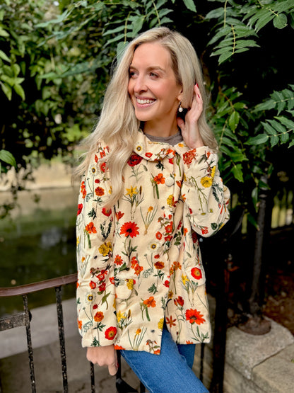 Wrap yourself in effortless elegance with our Rosehip Design Brompton Velvet Coat, designed in a rich velvet fabric that feels as luxurious as it looks. This statement coat features a playful autumn floral print, bringing warmth and charm to your seasonal wardrobe. Fully lined in co-ordinating checks, it offers a refined contrast and a polished finish inside and out.