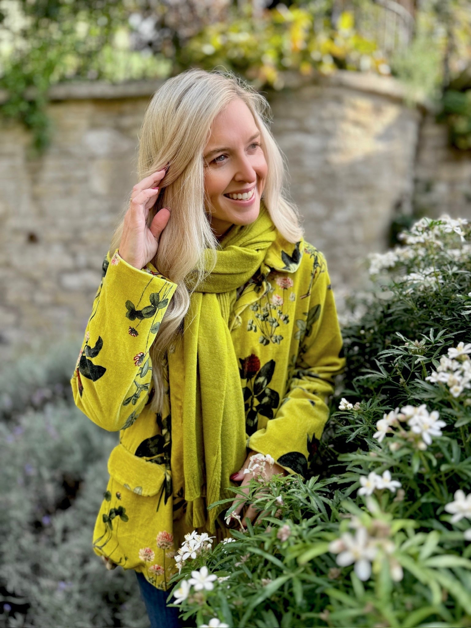 Wrap yourself in effortless elegance with the Rosehip Design Brompton Velvet Coat, designed in a rich velvet fabric that feels as luxurious as it looks. This statement coat features a playful autumn floral print, bringing warmth and charm to your seasonal wardrobe. Fully lined in co-ordinating checks, it offers a refined contrast and a polished finish inside and out.