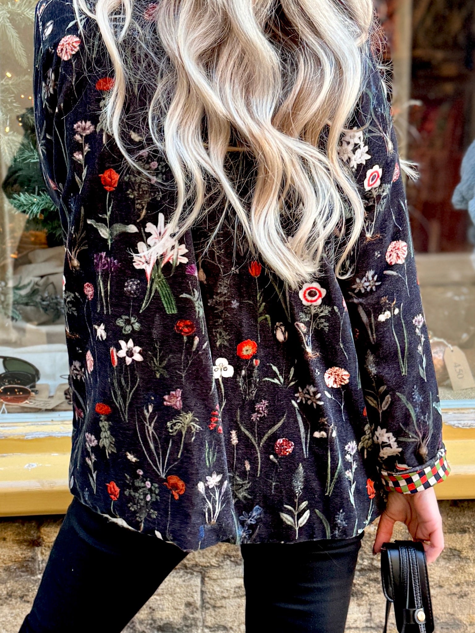 Wrap yourself in effortless elegance with the Rosehip Design Brompton Velvet Coat, designed in a rich velvet fabric that feels as luxurious as it looks. This statement coat features a playful autumn floral print, bringing warmth and charm to your seasonal wardrobe. Fully lined in co-ordinating checks, it offers a refined contrast and a polished finish inside and out.