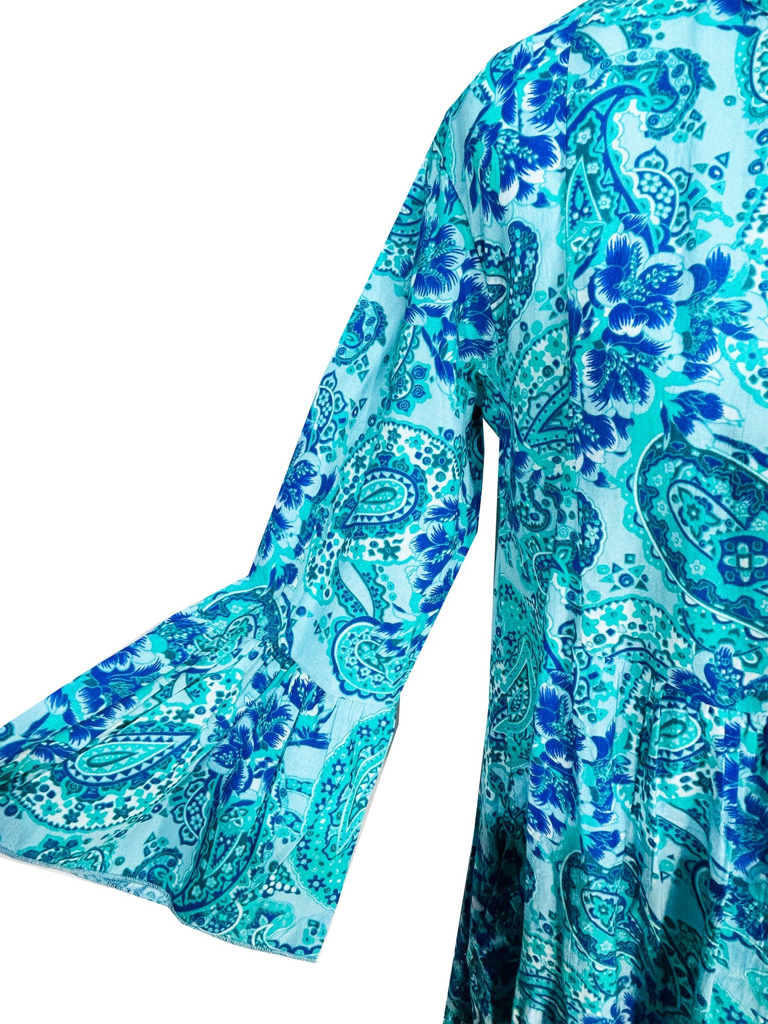 Rosehip Design Chloe Dress in Paisley Seagreen is a classic summer floral tiered dress printed in a fun design featuring the colours of the ocean with lovely long angel sleeves and side pockets, made from 100% soft Indian Cotton, packed in a matching bag.