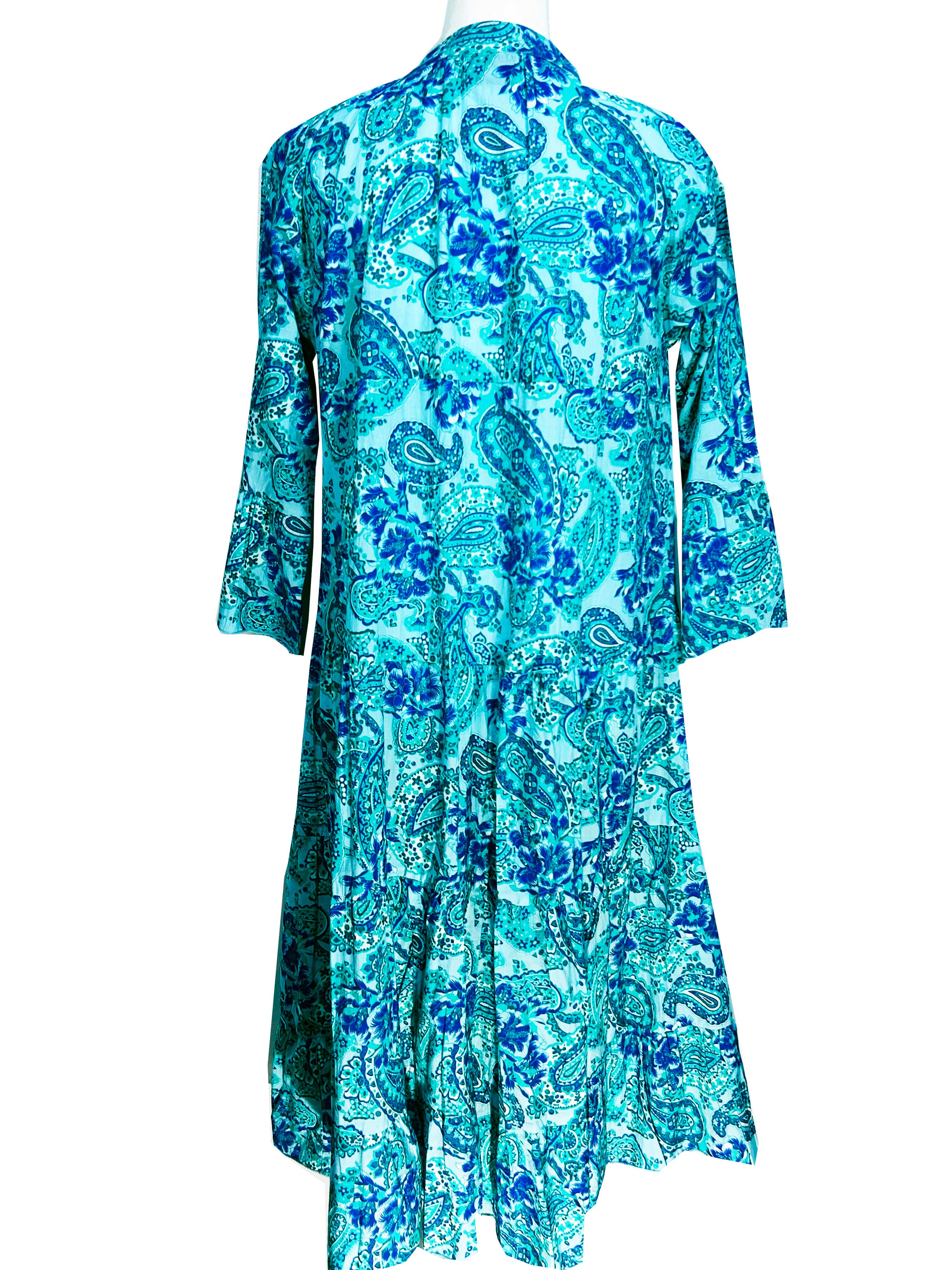 Rosehip Design Chloe Dress in Paisley Seagreen is a classic summer floral tiered dress printed in a fun design featuring the colours of the ocean with lovely long angel sleeves and side pockets, made from 100% soft Indian Cotton, packed in a matching bag.