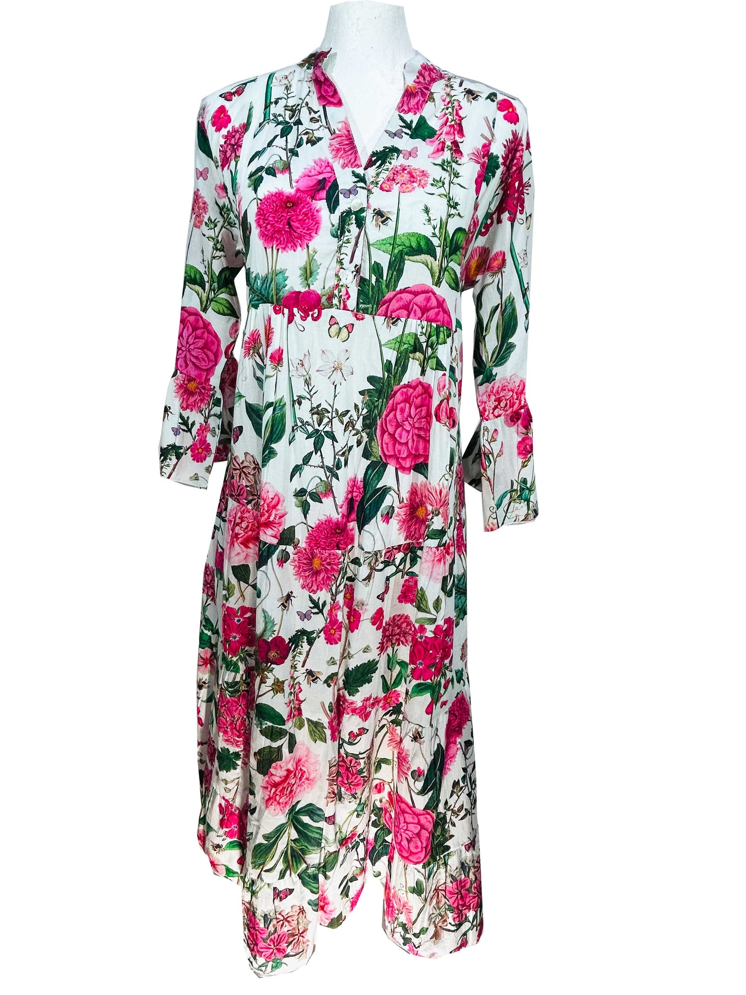 Rosehip Design Chloe Dress in Sweetpeas is a classic summer floral tiered dress printed in a vibrant mix of pinks, greens and reds with lovely long angel sleeves and side pockets, made from 100% soft Indian Cotton, packed in a matching bag.