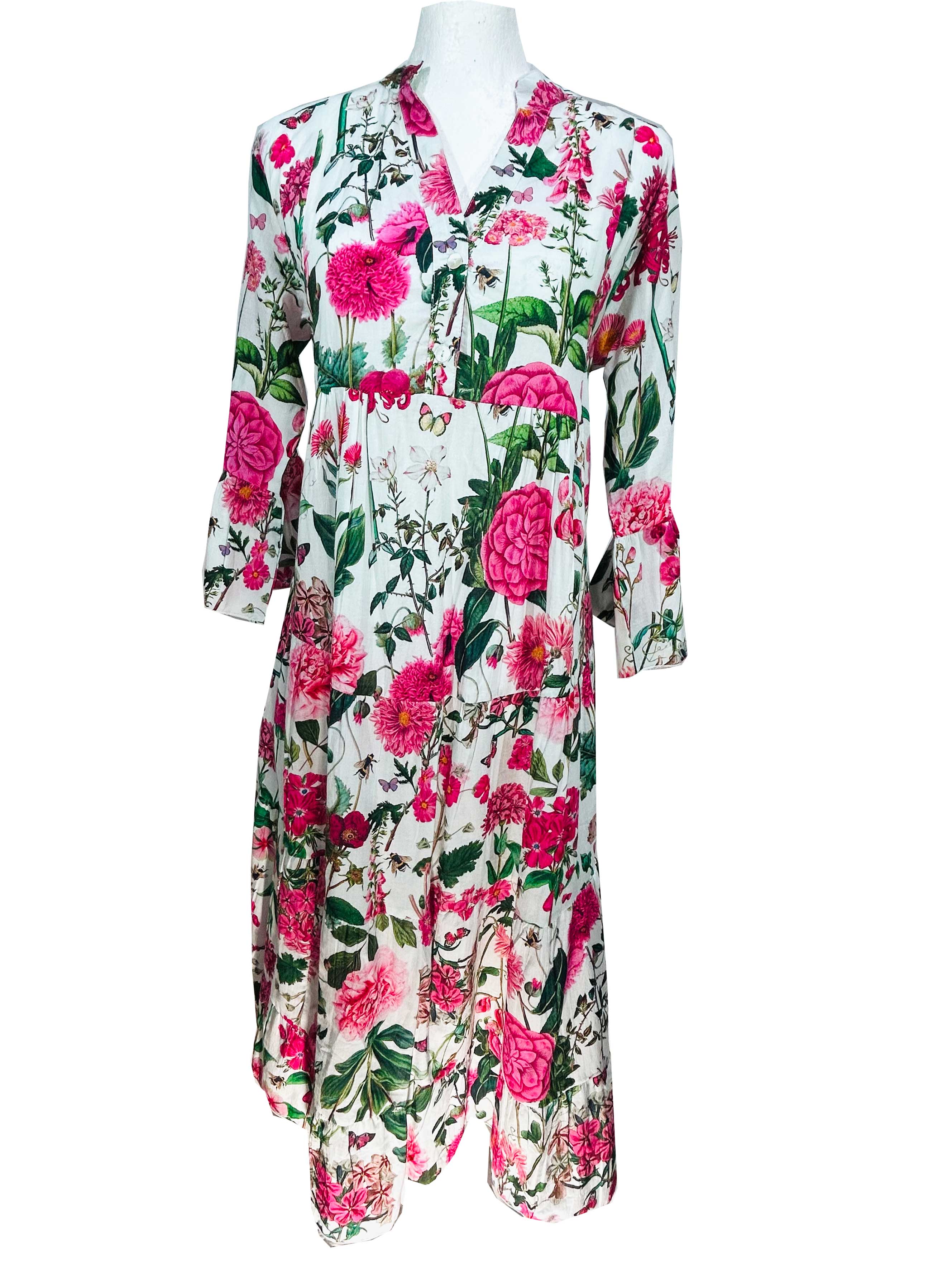 Rosehip Design Chloe Dress in Sweetpeas is a classic summer floral tiered dress printed in a vibrant mix of pinks, greens and reds with lovely long angel sleeves and side pockets, made from 100% soft Indian Cotton, packed in a matching bag.