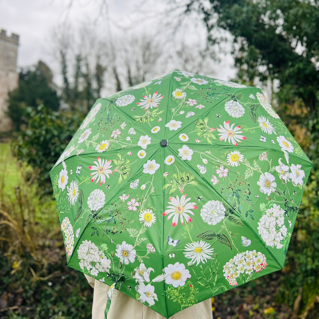 Rosehip Design Folding Umbrella is a sturdy, practical and waterproof rain umbrella with an auto pop-up button, perfectly sized for your car, bag or pocket. Our Heavenly Green design adds a touch of elegance with its verdant floral pattern, bringing a hint of nature&