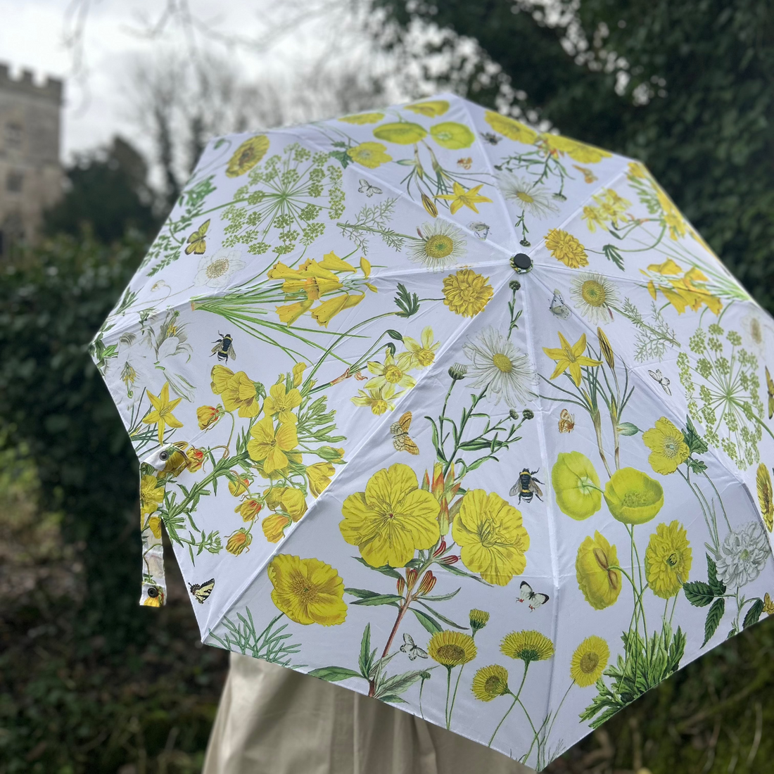 Rosehip Design Folding Umbrella is a sturdy, practical and waterproof rain umbrella with an auto pop-up button, perfectly sized for your car, bag or pocket. Stand out from the crowd with our sunny Mellow Yellow design.