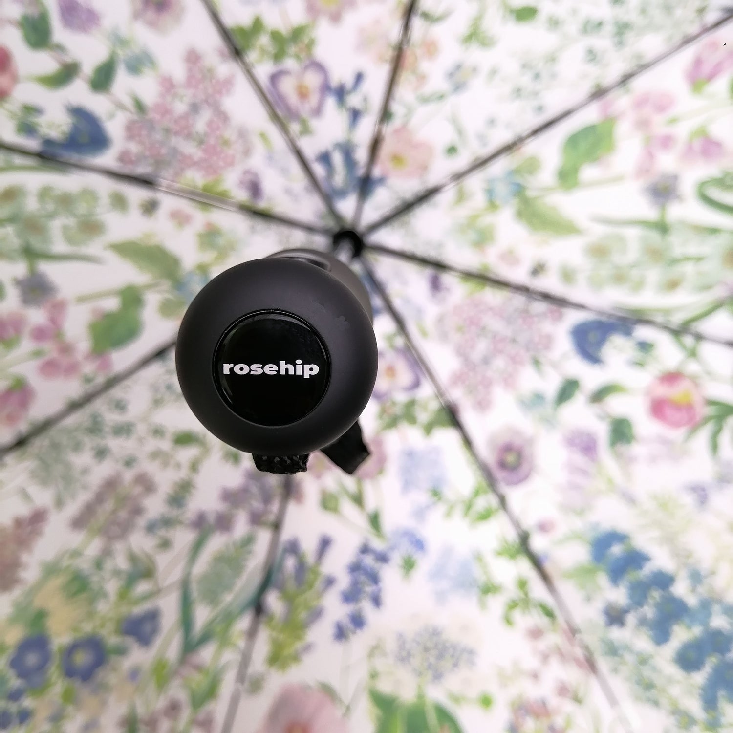 Rosehip Design Folding Umbrella is a sturdy, practical and waterproof rain umbrella with an auto pop-up button, perfectly sized for your car, bag or pocket. Our pretty Pansies design is sure to add a touch of brightness to even the dampest of days.