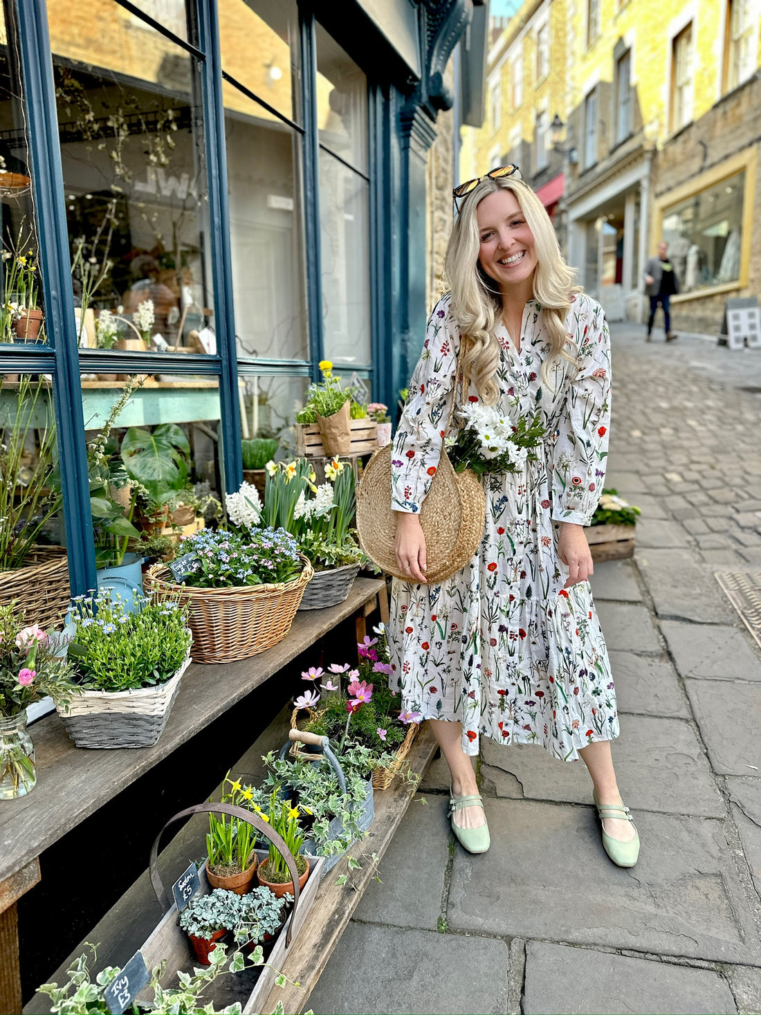 Easy, breezy and beautifully floral – the Georgie Dress is made from soft, breathable cotton and designed with sunny days in mind. Featuring our delightful April design - a fresh summery floral print, it has a relaxed tiered skirt, charming button-through front, and a detachable tie belt to style it your way. Wear it loose for an effortlessly laid-back look, or cinch it in for a more defined shape. Perfect for garden parties, picnics or simply soaking up the sunshine.