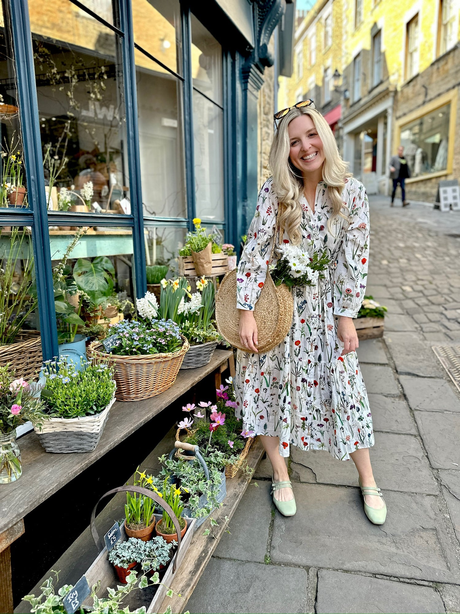 Easy, breezy and beautifully floral – the Georgie Dress is made from soft, breathable cotton and designed with sunny days in mind. Featuring our delightful April design - a fresh summery floral print, it has a relaxed tiered skirt, charming button-through front, and a detachable tie belt to style it your way. Wear it loose for an effortlessly laid-back look, or cinch it in for a more defined shape. Perfect for garden parties, picnics or simply soaking up the sunshine.