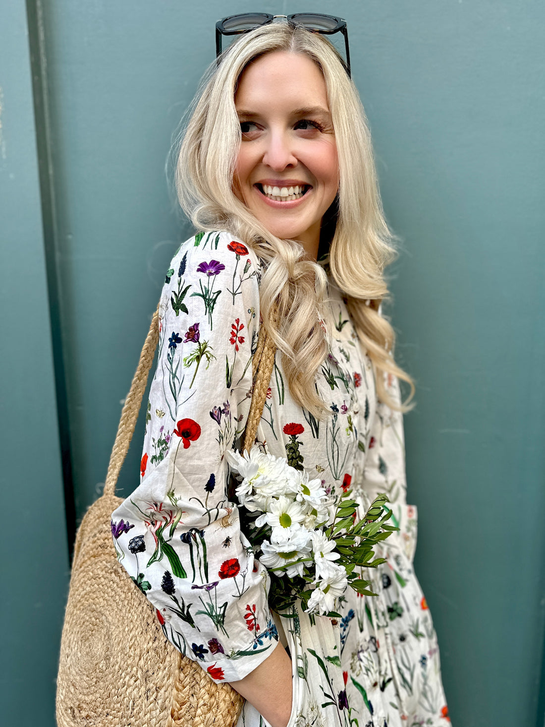 Easy, breezy and beautifully floral – the Georgie Dress is made from soft, breathable cotton and designed with sunny days in mind. Featuring our delightful April design - a fresh summery floral print, it has a relaxed tiered skirt, charming button-through front, and a detachable tie belt to style it your way. Wear it loose for an effortlessly laid-back look, or cinch it in for a more defined shape. Perfect for garden parties, picnics or simply soaking up the sunshine.