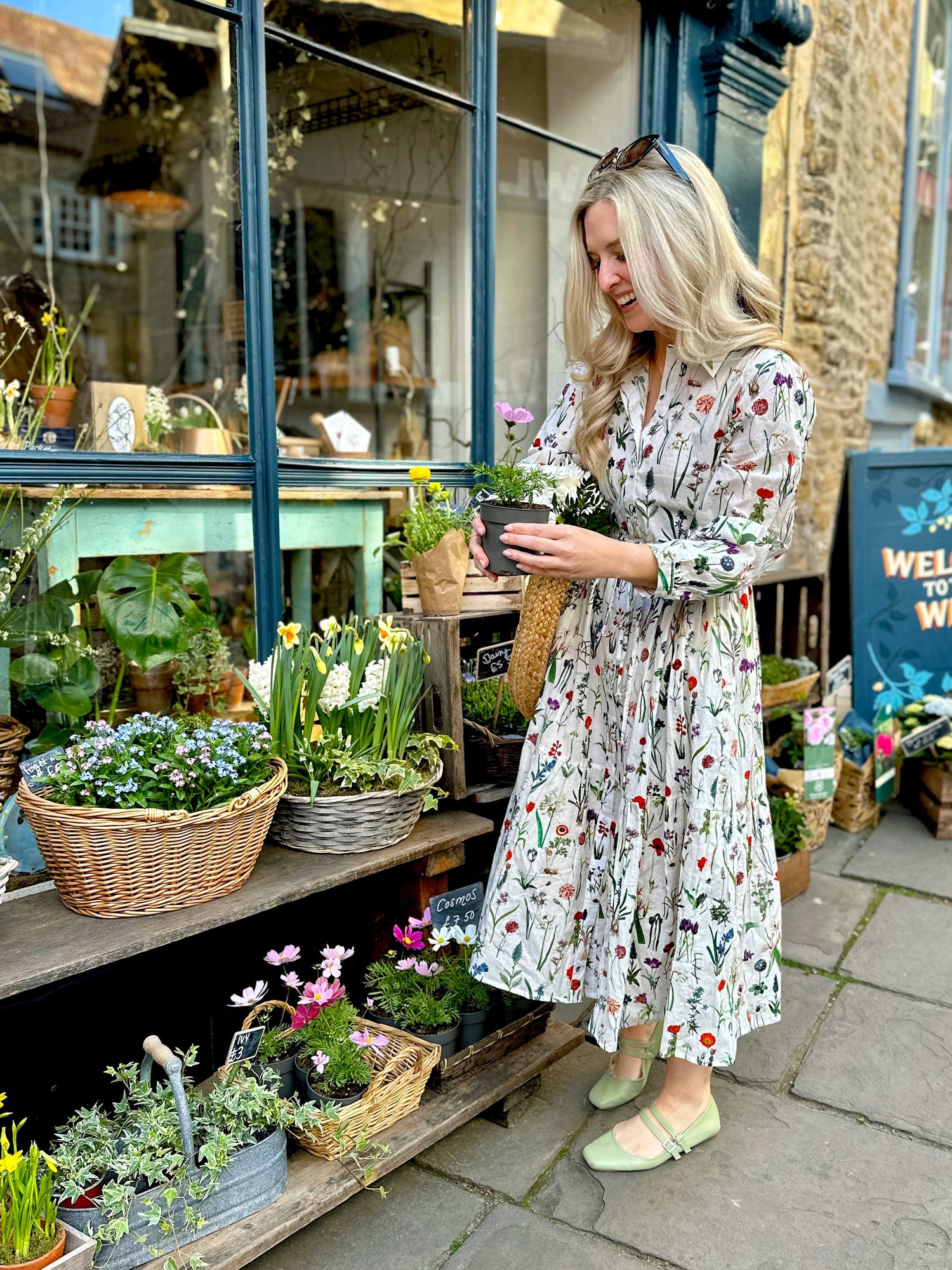Easy, breezy and beautifully floral – the Georgie Dress is made from soft, breathable cotton and designed with sunny days in mind. Featuring our delightful April design - a fresh summery floral print, it has a relaxed tiered skirt, charming button-through front, and a detachable tie belt to style it your way. Wear it loose for an effortlessly laid-back look, or cinch it in for a more defined shape. Perfect for garden parties, picnics or simply soaking up the sunshine.