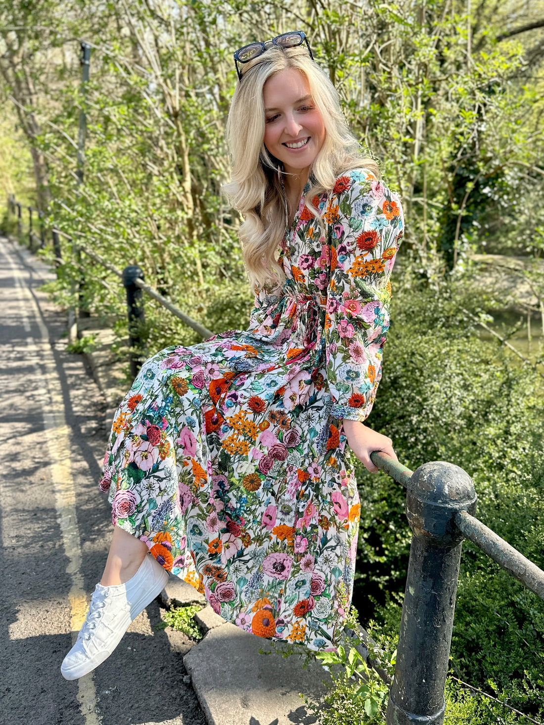 Easy, breezy and beautifully floral – the Rosehip Design Georgie Dress in our striking Fiesta print is made from soft, breathable cotton and designed with sunny days in mind. Featuring a fresh summery floral print, it has a relaxed tiered skirt, charming button-through front, and a detachable tie belt to style it your way. Wear it loose for an effortlessly laid-back look, or cinch it in for a more defined shape. Perfect for garden parties, picnics or simply soaking up the sunshine.