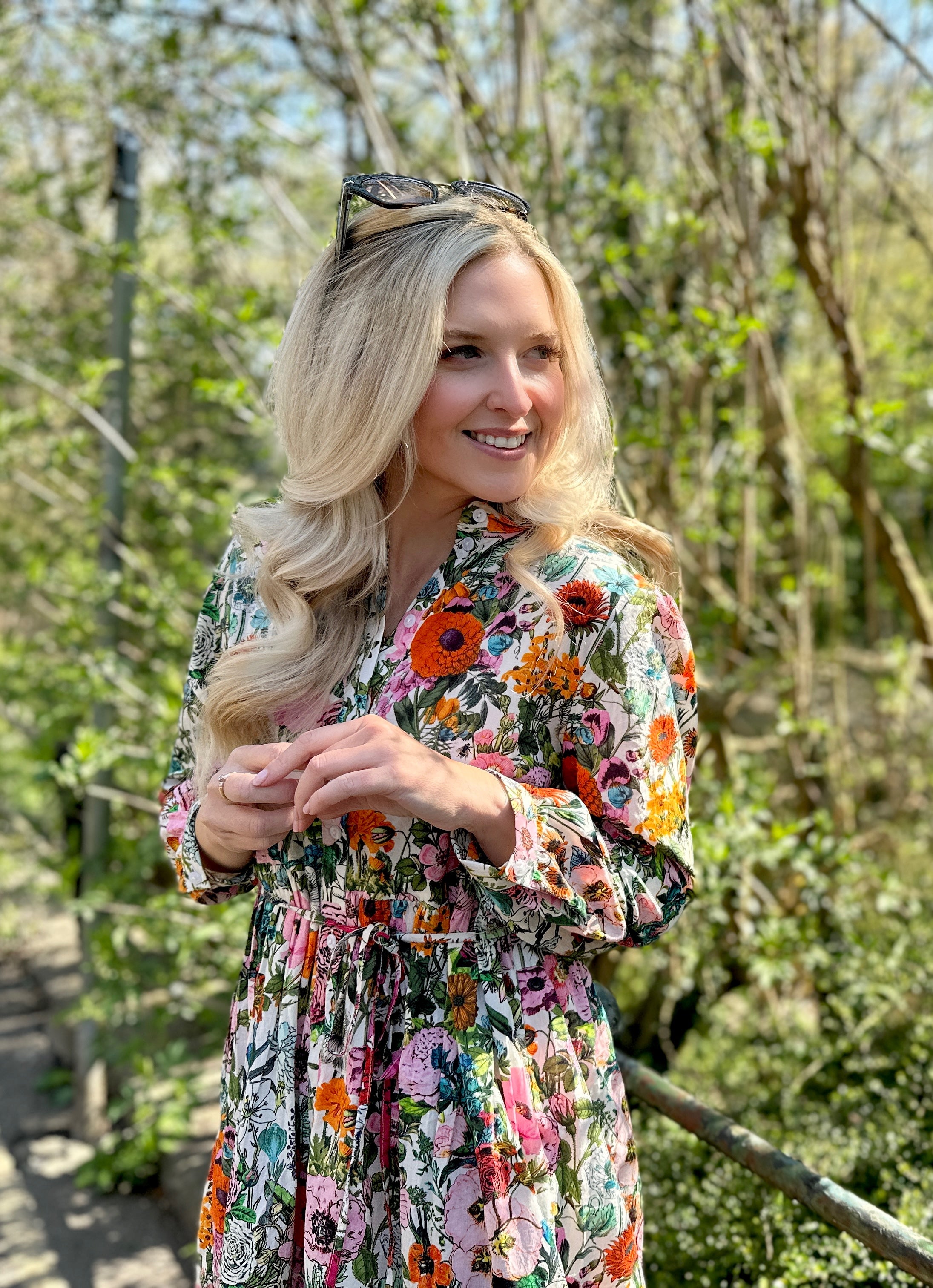 Easy, breezy and beautifully floral – the Rosehip Design Georgie Dress in our striking Fiesta print is made from soft, breathable cotton and designed with sunny days in mind. Featuring a fresh summery floral print, it has a relaxed tiered skirt, charming button-through front, and a detachable tie belt to style it your way. Wear it loose for an effortlessly laid-back look, or cinch it in for a more defined shape. Perfect for garden parties, picnics or simply soaking up the sunshine.