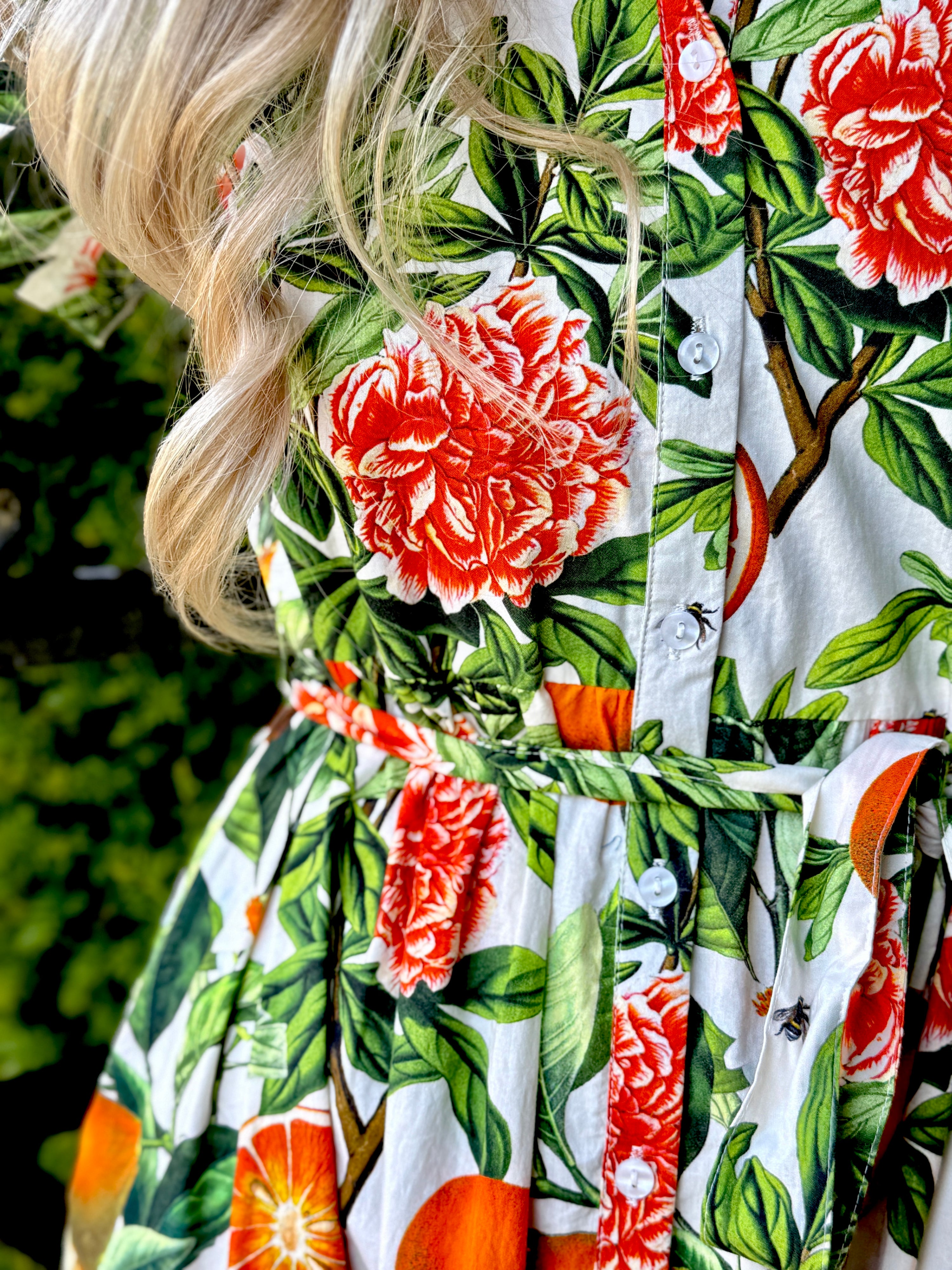 The Rosehip Design Grace Cotton Dress is a maxi style dress made of 100% Cotton Poplin.

Stylishly designed with buttons down the front, a tuck between tiers, short sleeves, and of course, side pockets.
