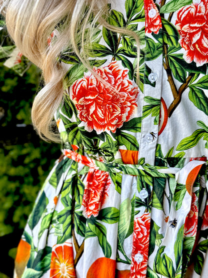 The Rosehip Design Grace Cotton Dress is a maxi style dress made of 100% Cotton Poplin.

Stylishly designed with buttons down the front, a tuck between tiers, short sleeves, and of course, side pockets.
