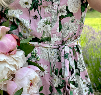 The Rosehip Design Grace Cotton Dress is a maxi style dress made of 100% Cotton Poplin.

Stylishly designed with buttons down the front, a tuck between tiers, short sleeves, and of course, side pockets.
