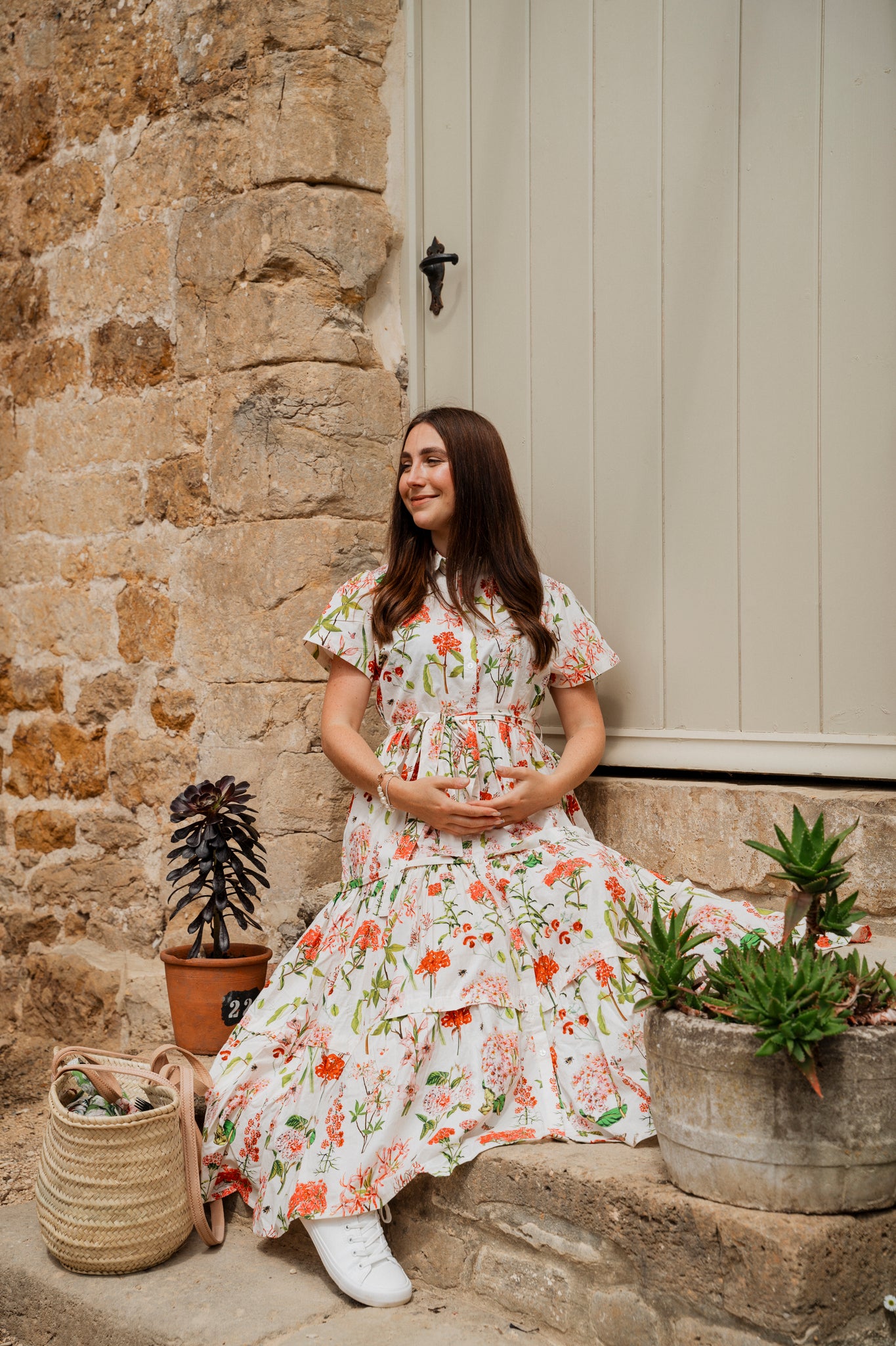 The Rosehip Design Grace Cotton Dress is a maxi style dress made of 100% Cotton Poplin.

Stylishly designed with buttons down the front, a tuck between tiers, short sleeves, and of course, side pockets.
