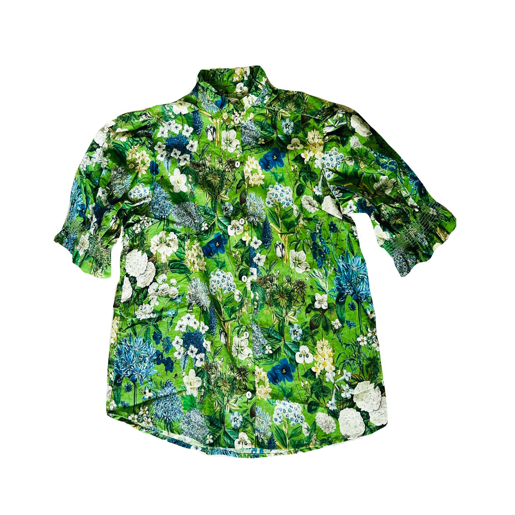 Rosehip Design Hannah Cotton Shirt in Spring Greens is a timeless blend of elegance and comfort. Made from soft cotton, it features a delicate frilled collar and intricate smocking on the sleeves for a touch of vintage charm. Designed for effortless styling, it pairs beautifully with the matching Bella Skirt.