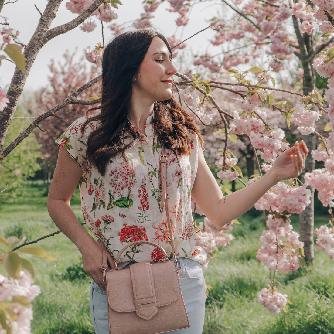 Light, breathable, and effortlessly stylish — the Jemma Shirt from Rosehip Design is made from 100% pure linen and finished with our soft floral Spring Blossom print. Designed with a neat collar, a partial button front, and gently capped sleeves, it&