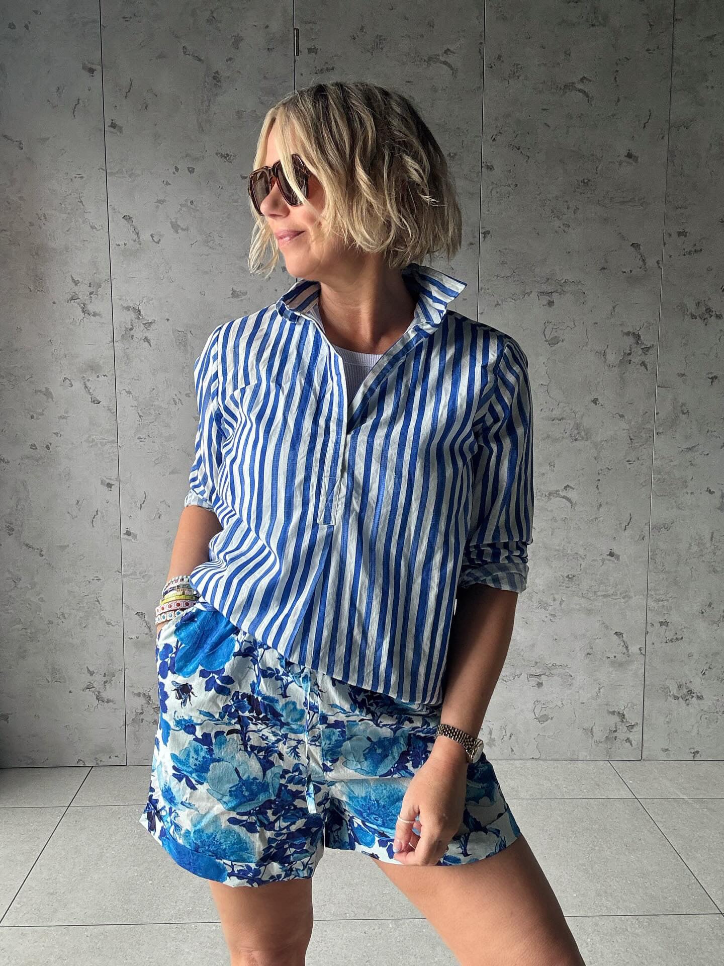 Rosehip Design Julia is a tunic style shirt with bold blue, washed stripes. It&