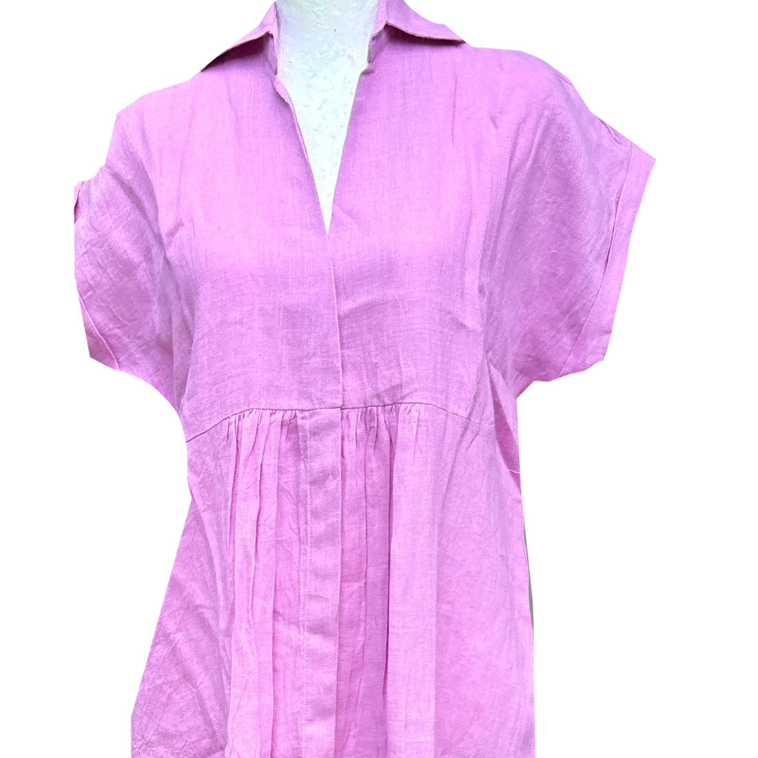 Rosehip Design Kate in our striking Lilac colourway is a magnificent, elegant summer dress made from 100% Linen. It has short, cuffed sleeves, hidden buttons down the front, a few pleats under the bust and curved side slits. 