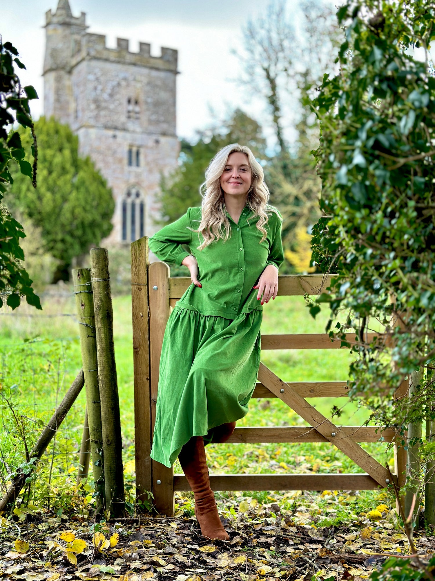 Rosehip Design Laura Dress - step into elegance with our Corduroy Maxi Dress, a perfect fusion of fashion and comfort in verdant Green. This dress boasts a gracefully dropped waist, creating a flattering and relaxed silhouette that effortlessly captures style with ease.