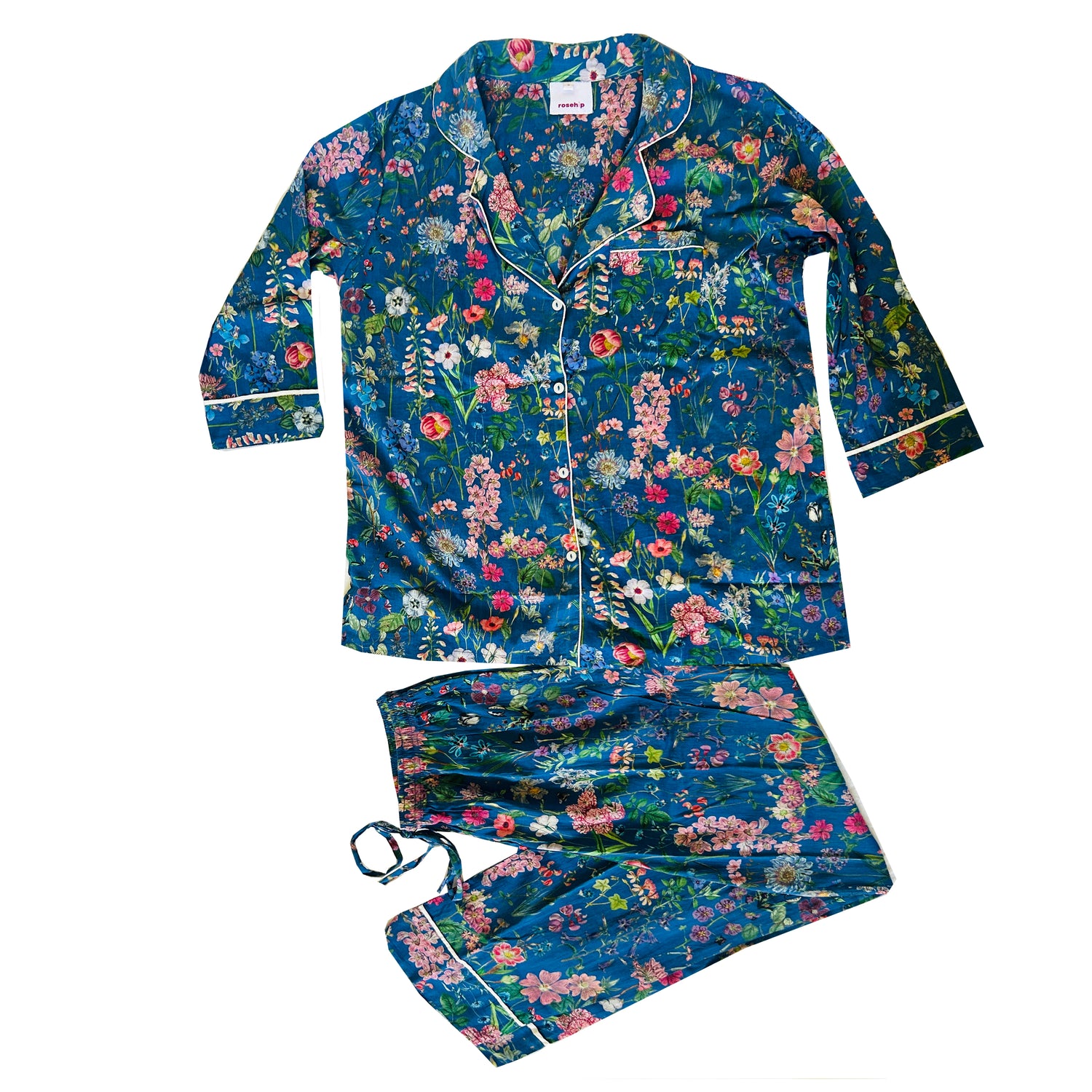 Rosehip Design Long Pyjamas in our bold Horsley Navy print are made from 100% soft Indian cotton voile. The cuffs have contrast piping and the bottoms have drawstring as well as elastic. They are a comfy fit and come packaged in a matching drawstring bag.