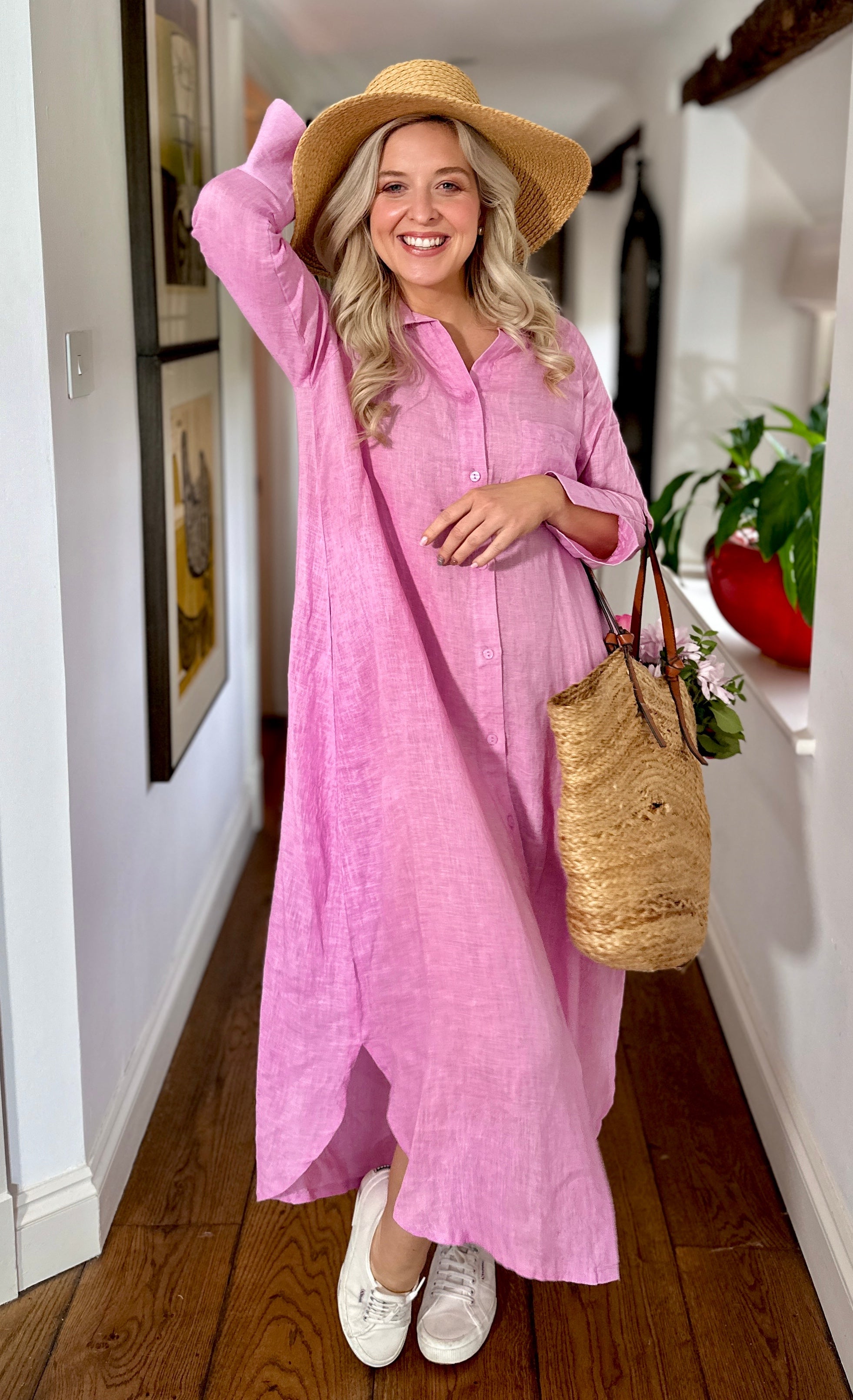 Rosehip Design Lucy Dress is a classic Shirt dress with 3/4 length sleeves, side pockets, front buttons and curved side slits. Made from 100% Linen in vivid Lilac.